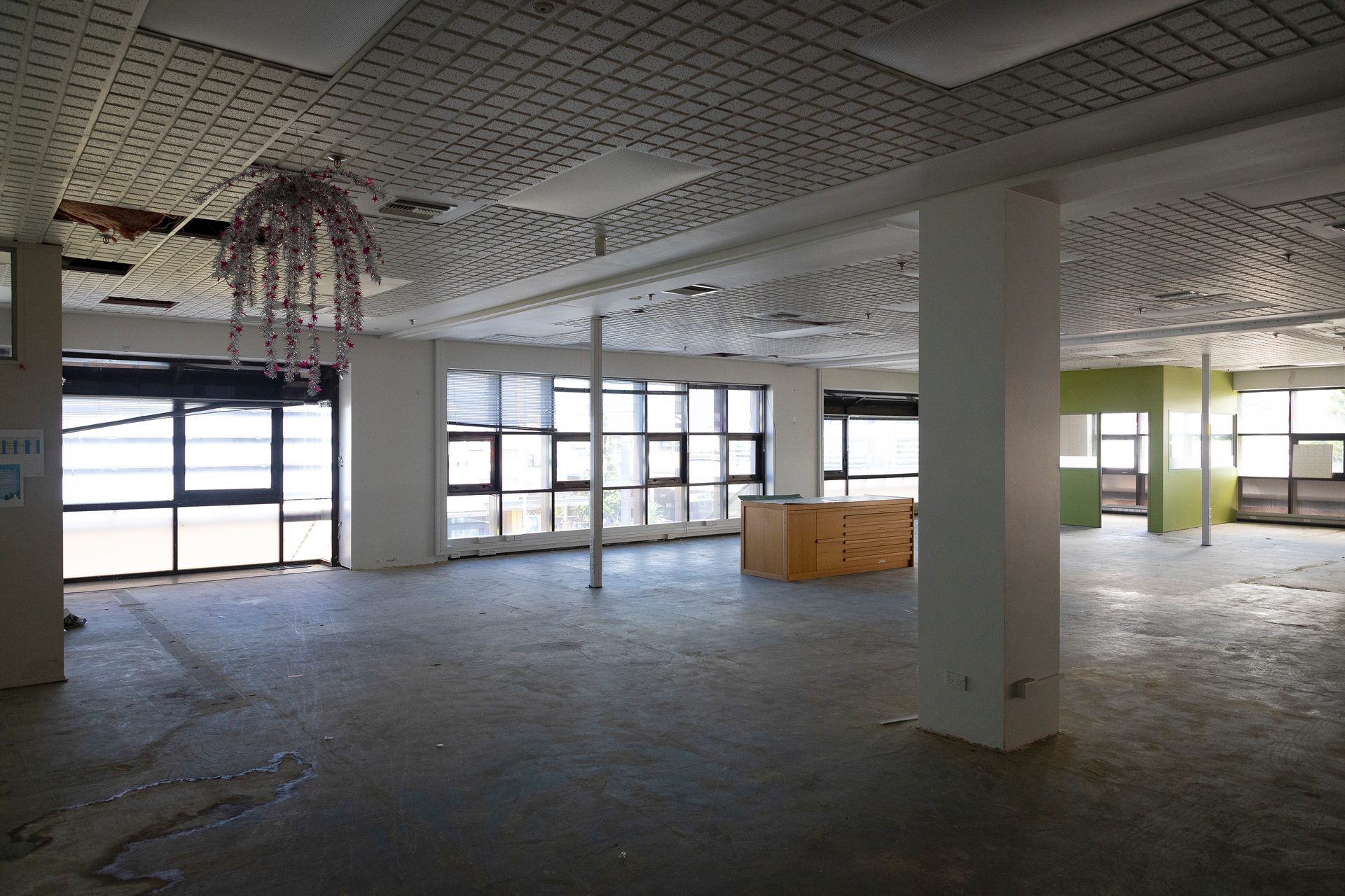Christmas decorations still hang from the ceiling at Tauranga City Council's sealed-off first floor, which was evacuated in 2014 due to toxic black mould. Photo / Andrew Warner