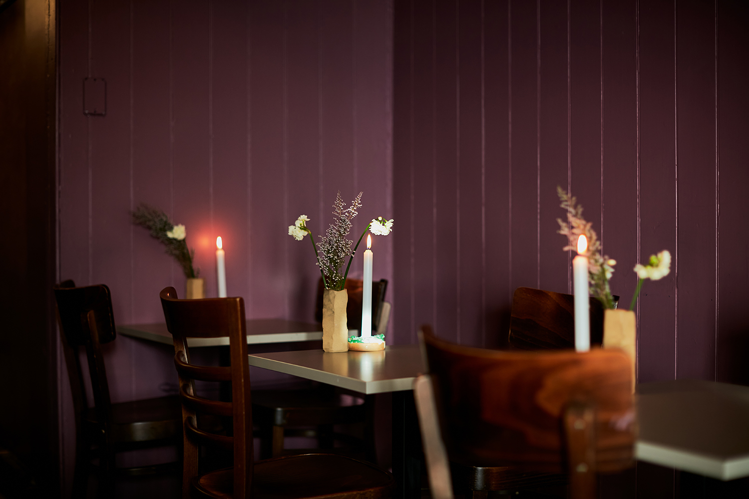 “Each tiny table has a small vase with a flower next to a candle and the flame flickers from time to time not, I think, due to breeze but because it’s struggling for oxygen,” says Jesse Mulligan Photo / Babiche Martens