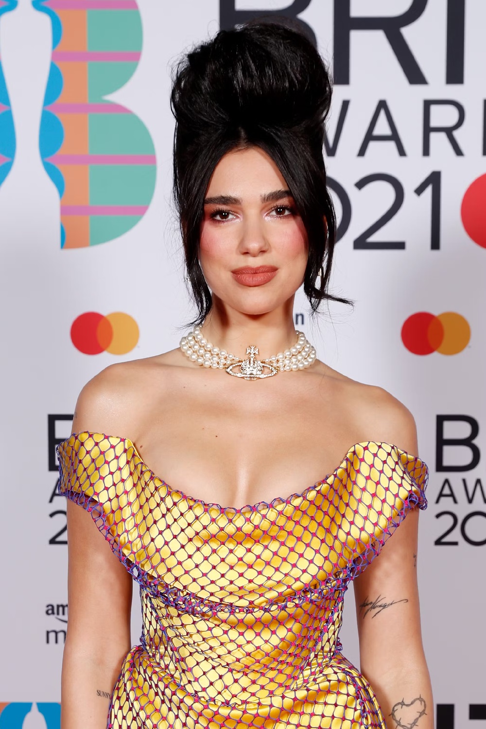 Dua Lipa wearing Vivienne Westwood's iconic pearl choker at the 2021 Brit Awards. Photo / Getty Images