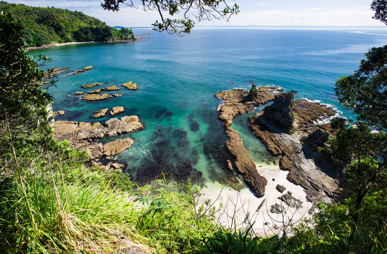 Ōtarawairere beach has been likened to the scenery of Italy’s Cinque Terre. Photo / Tourism Bay of Plenty