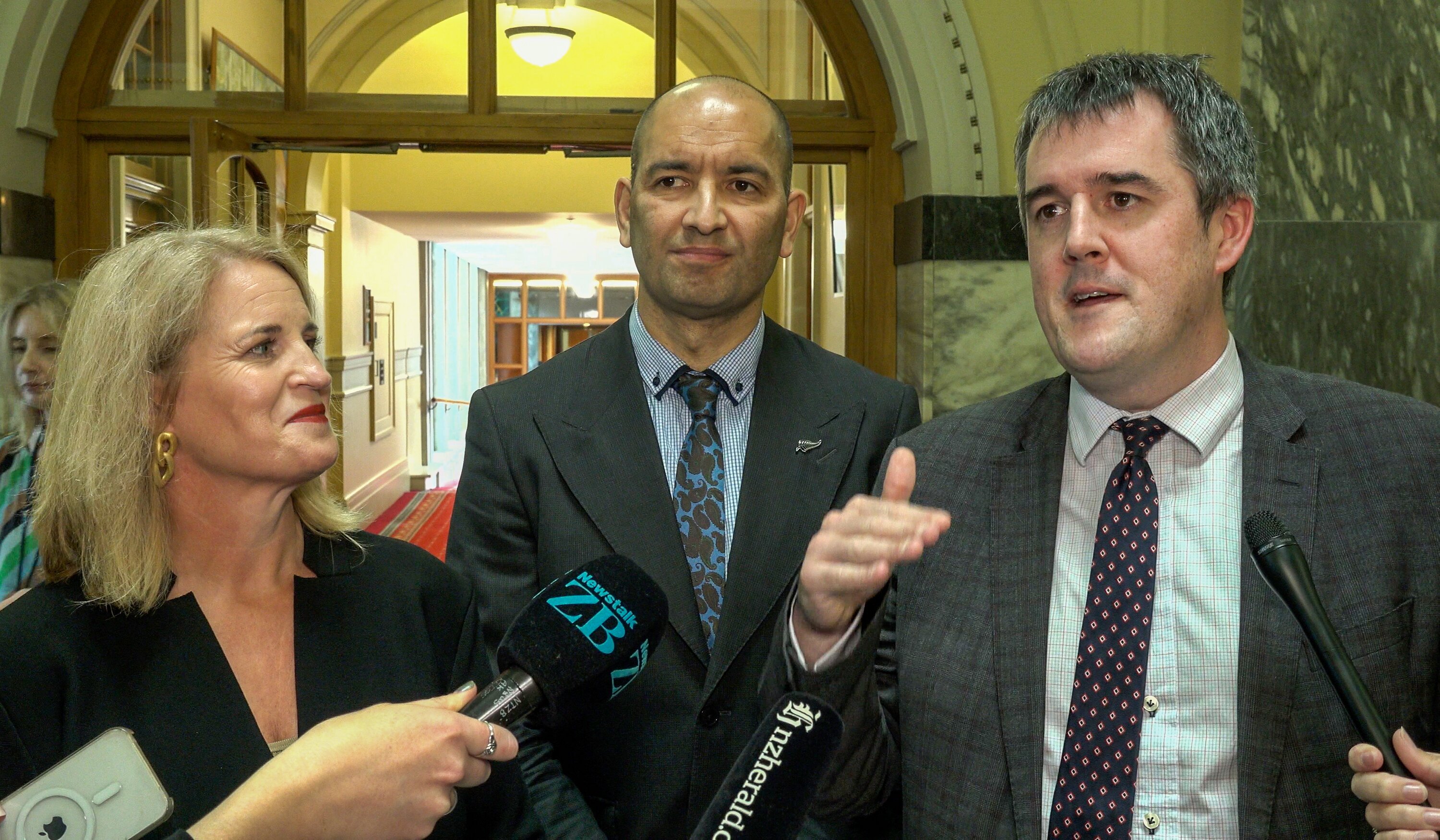 Housing Minister Chris Bishop (right) with Social Development Minister Louise Upston and Associate Housing Minister Tama Potaka. Photo / Mark Mitchell