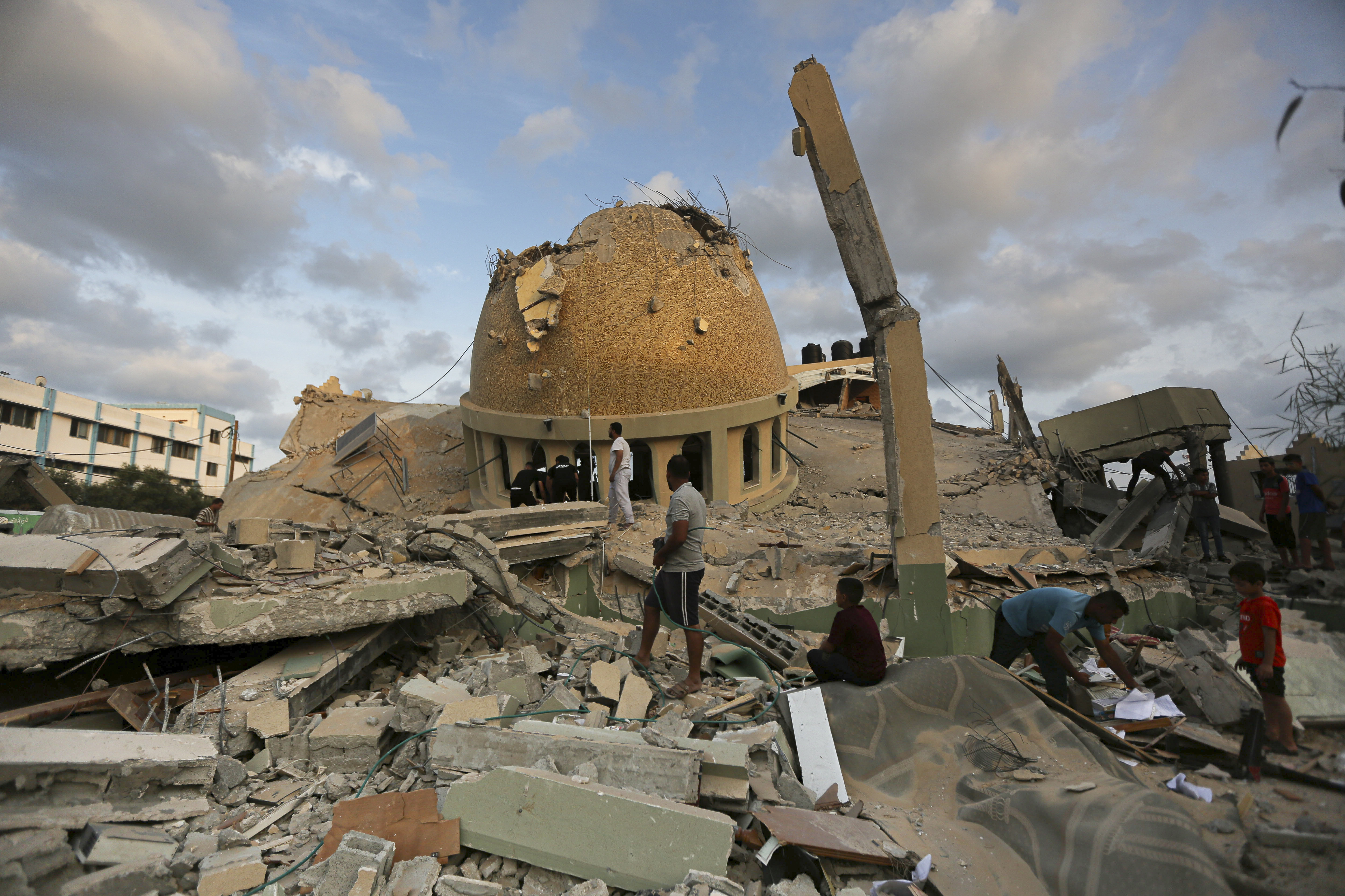 The Hamas militants broke out of the Gaza Strip and rampaged through nearby Israeli communities, while Israel's retaliation strikes levelled buildings in Gaza. Photo / AP