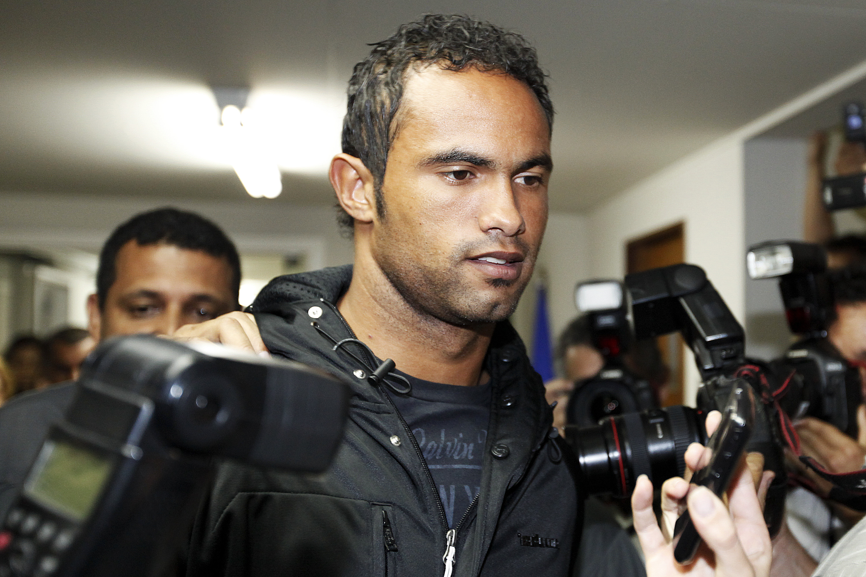 Football: Brazilian goalkeeper who murdered his girlfriend and fed her body  to his dogs is given day release to teach football to children - NZ Herald