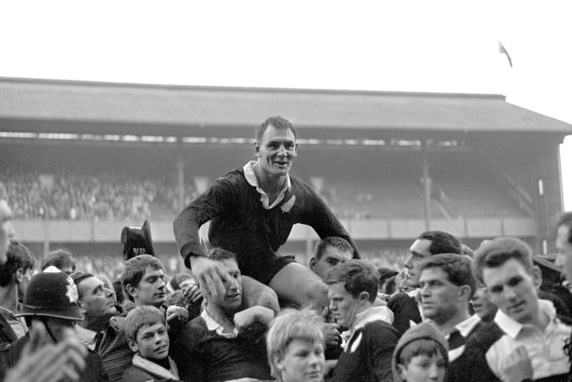 Brian Lochore is chaired off by his triumphant teammates after leading the All Blacks to victory in the final game of their tour to Great Britain, France and Canada in 1967. Photo / Getty Images