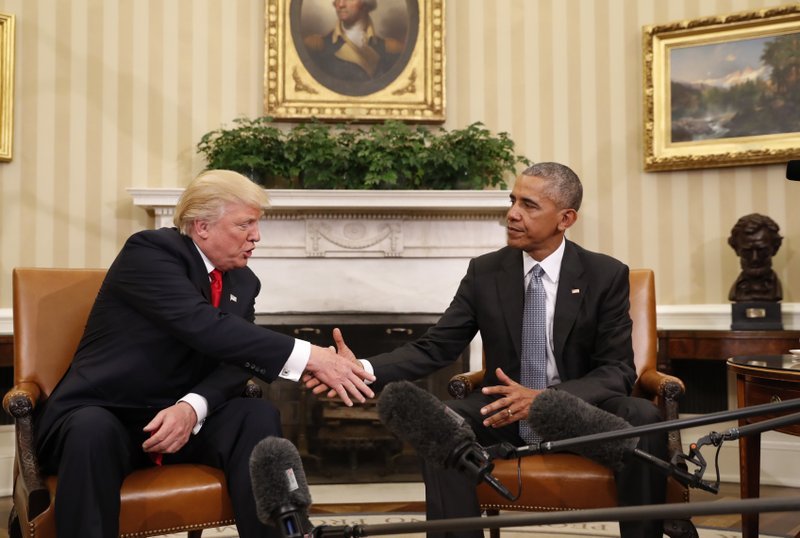 President Barack Obama shakes hands with President-elect Donald Trump in the Oval Office of the White House in Washington. Photo / AP