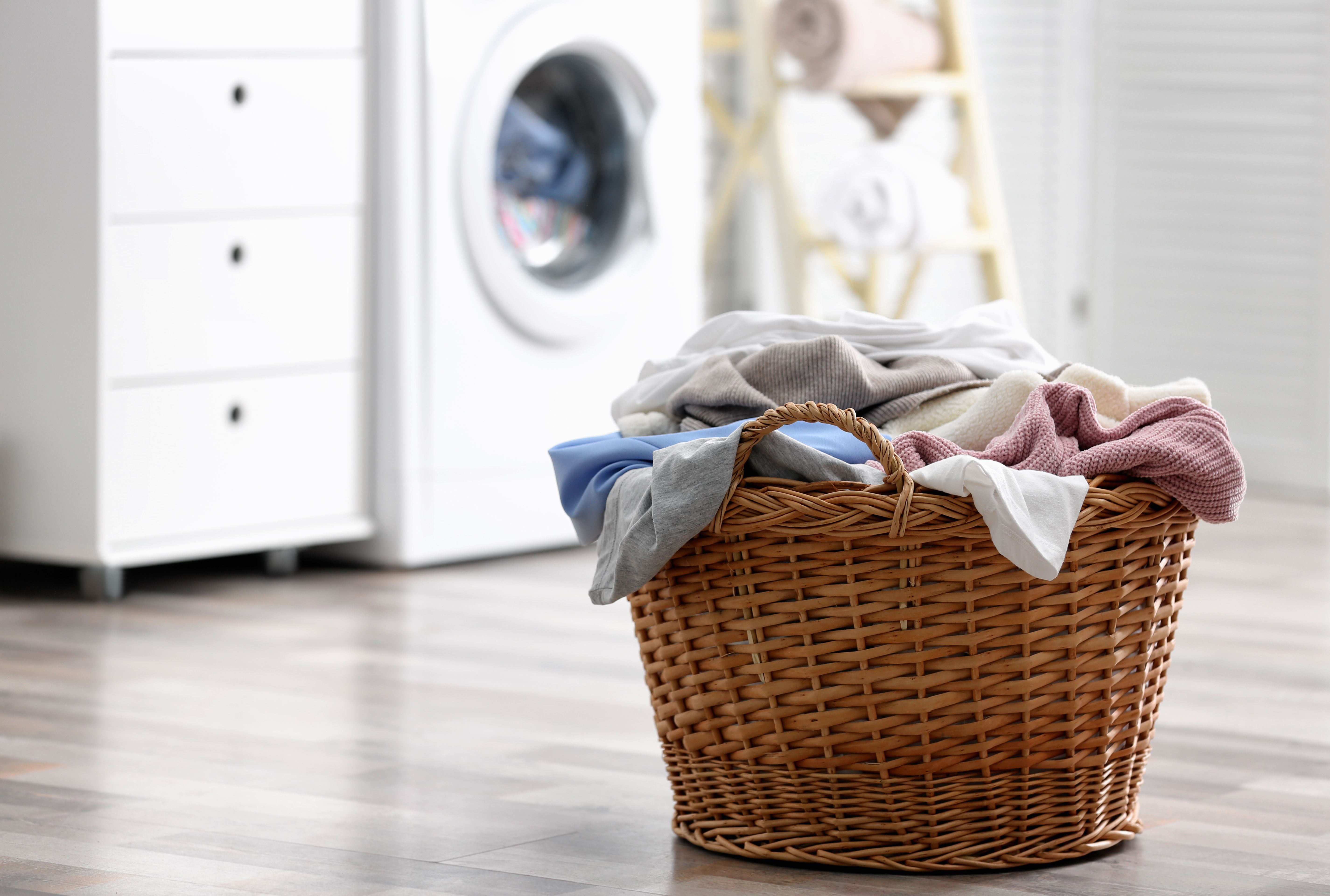Deciding where you’ll put your laundry basket is a key step when adopting a sustainable laundry routine. Photo / 123RF