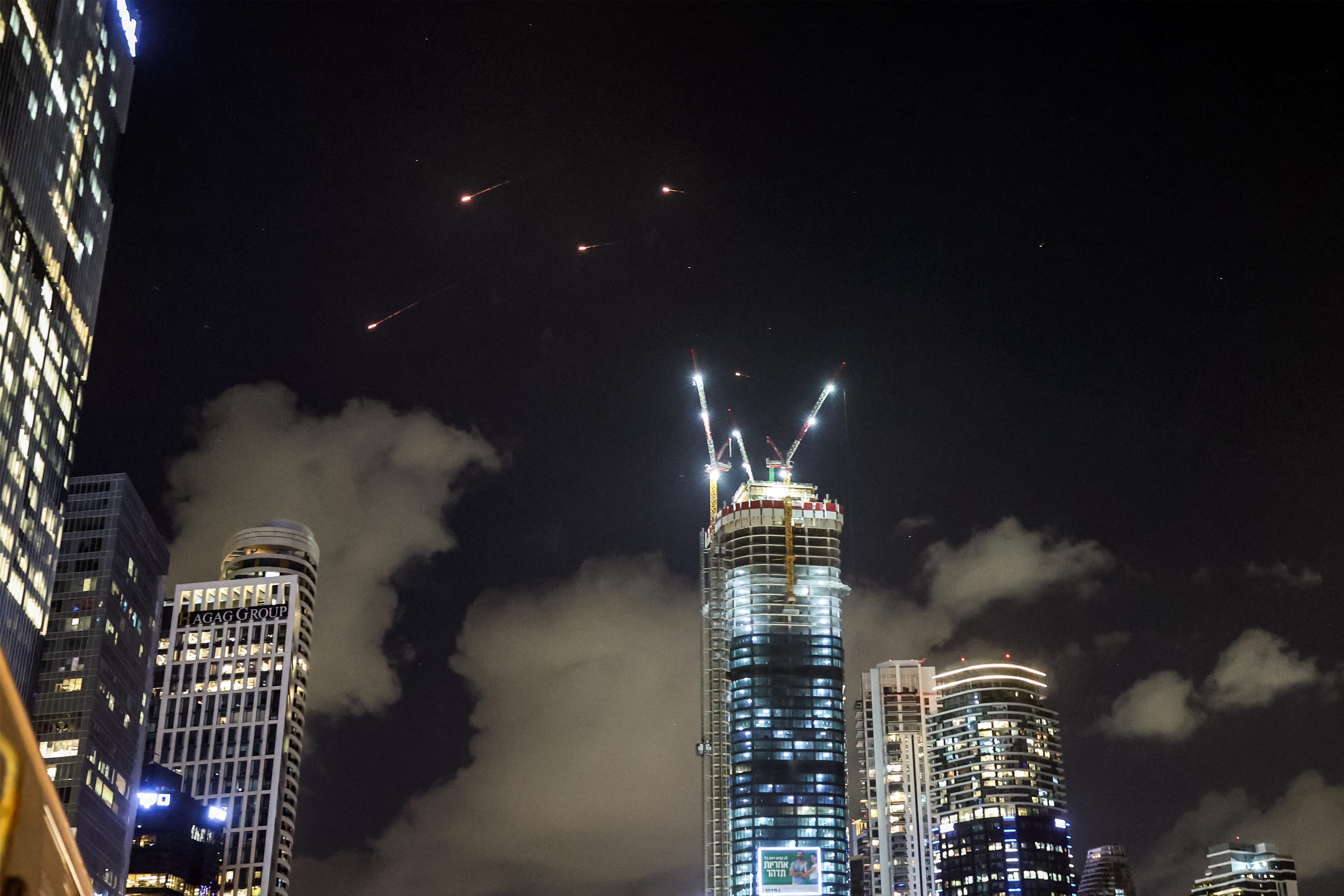 This picture shows projectiles being intercepted above Tel Aviv a day after the Israeli army launched ground operations into southern Lebanon. Photo / AFP