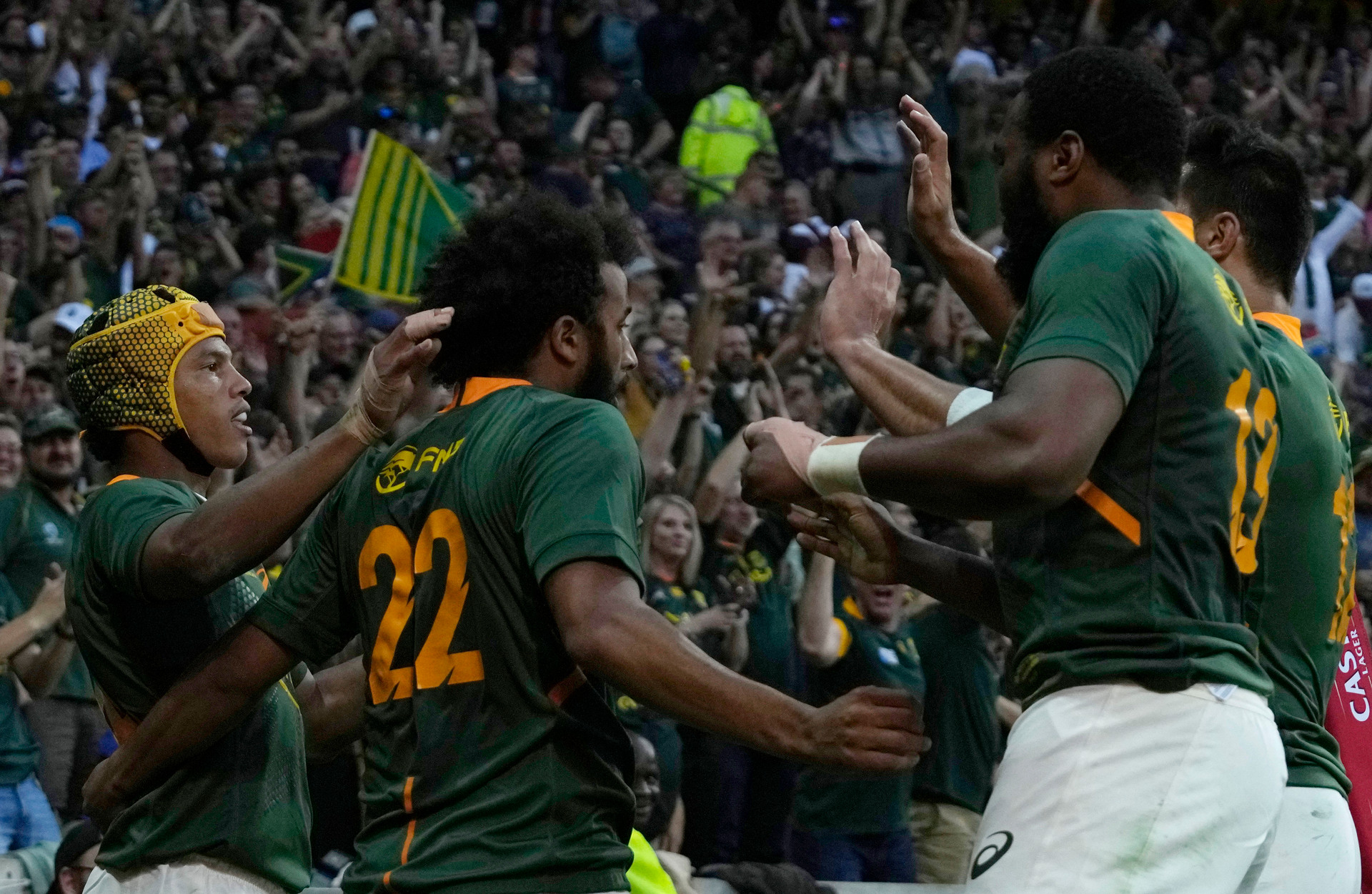 South Africa's Kurt-Lee Arendse, left, celebrates with teammates after scoring a try. Photo / AP