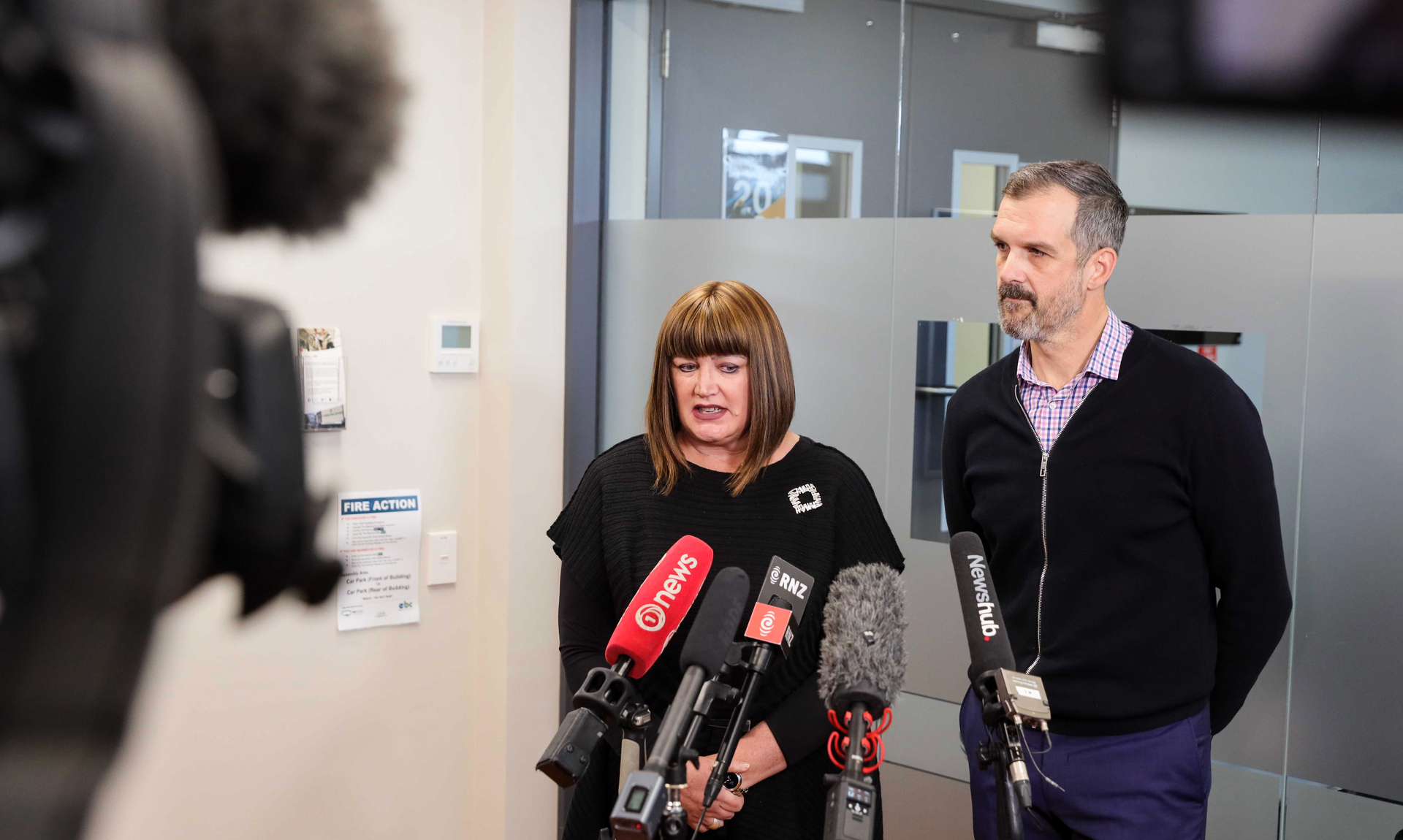 Raelene Castle and Jacques Landry front a press conference at the Cambridge Velodrome following Podmore's death. Photo / Mike Scott