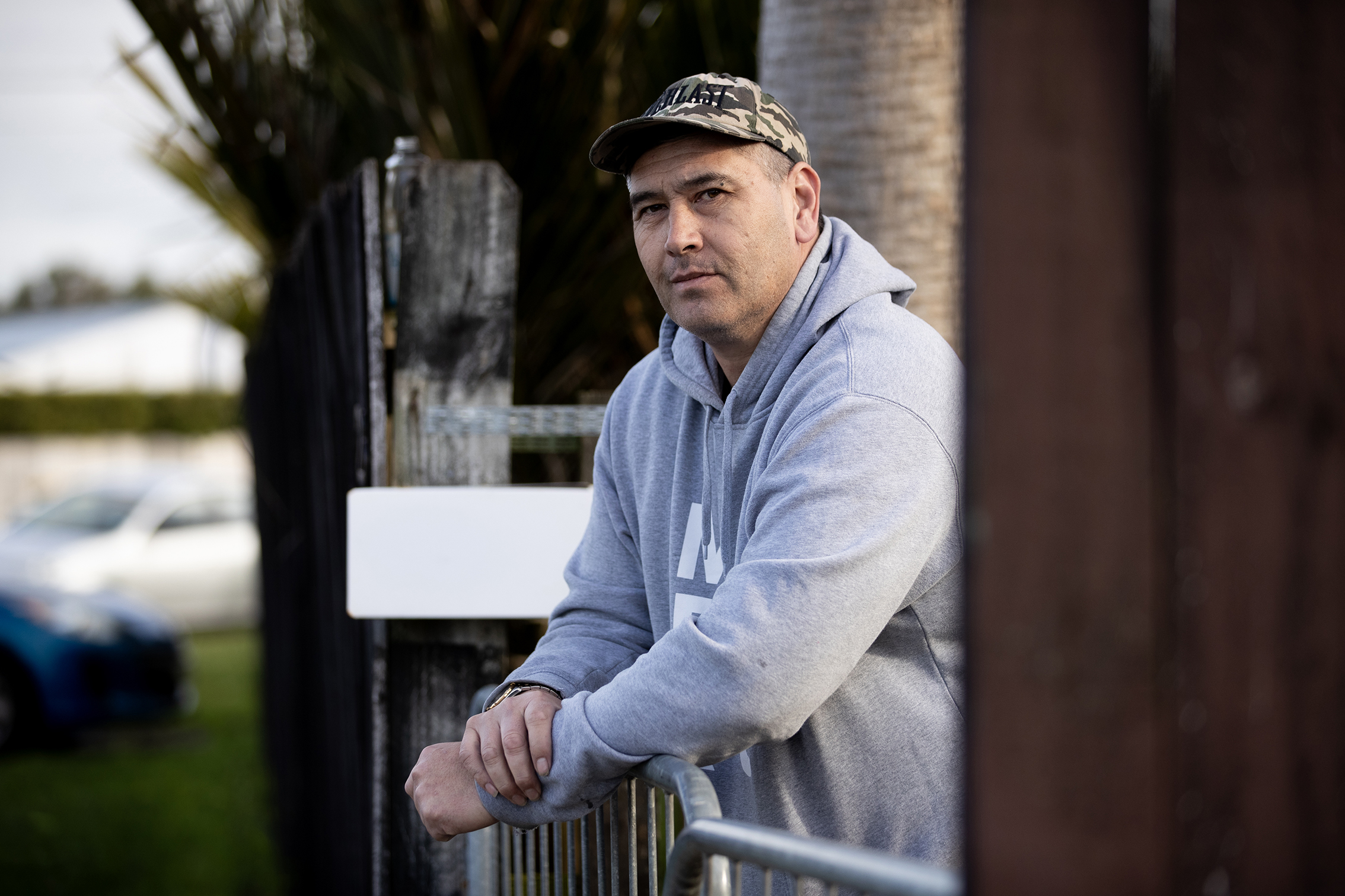 William Macneil outside his home in Beach Haven, where a neighbour lunged at him with a butcher's knife. Photo / Dean Purcell