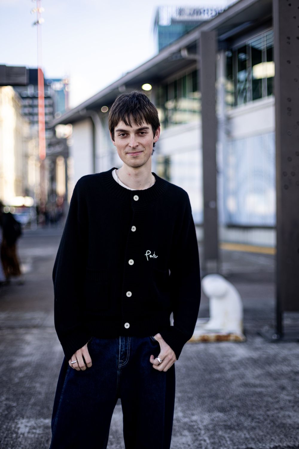 Felix Jackson, a photographer working at both New Zealand Fashion Week: Kahuria and Te Wiki Āhua o Aotearoa, wears a Porter James jumper (Felix says comfort is key). Photo / Dean Purcell