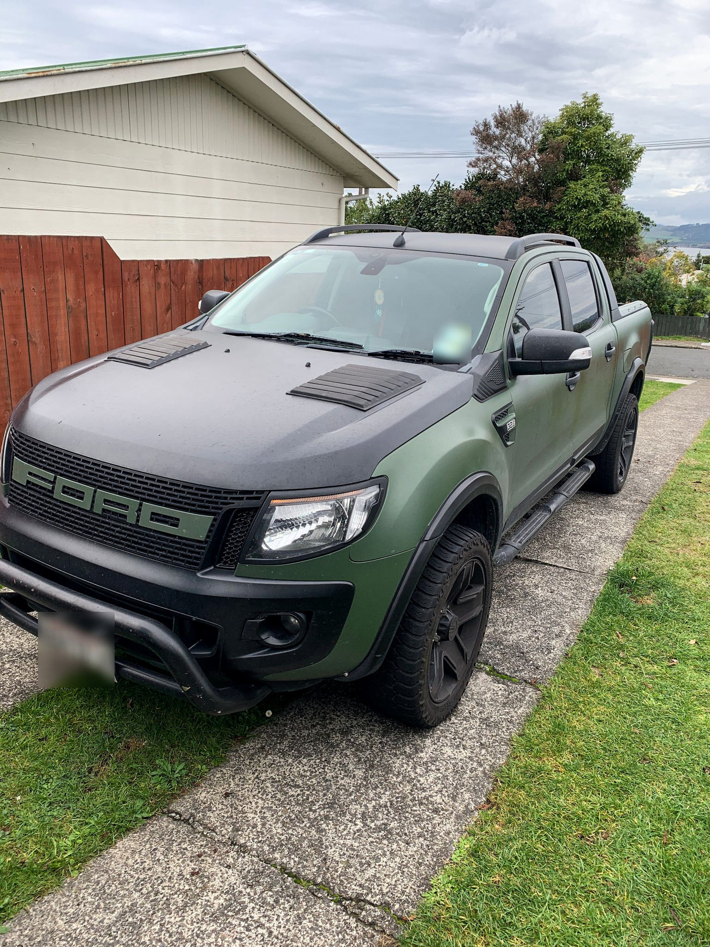 14 vehicles including two marine vessels, estimated over one million dollars in cash and number of mobile phones were also seized. Photo / NZH