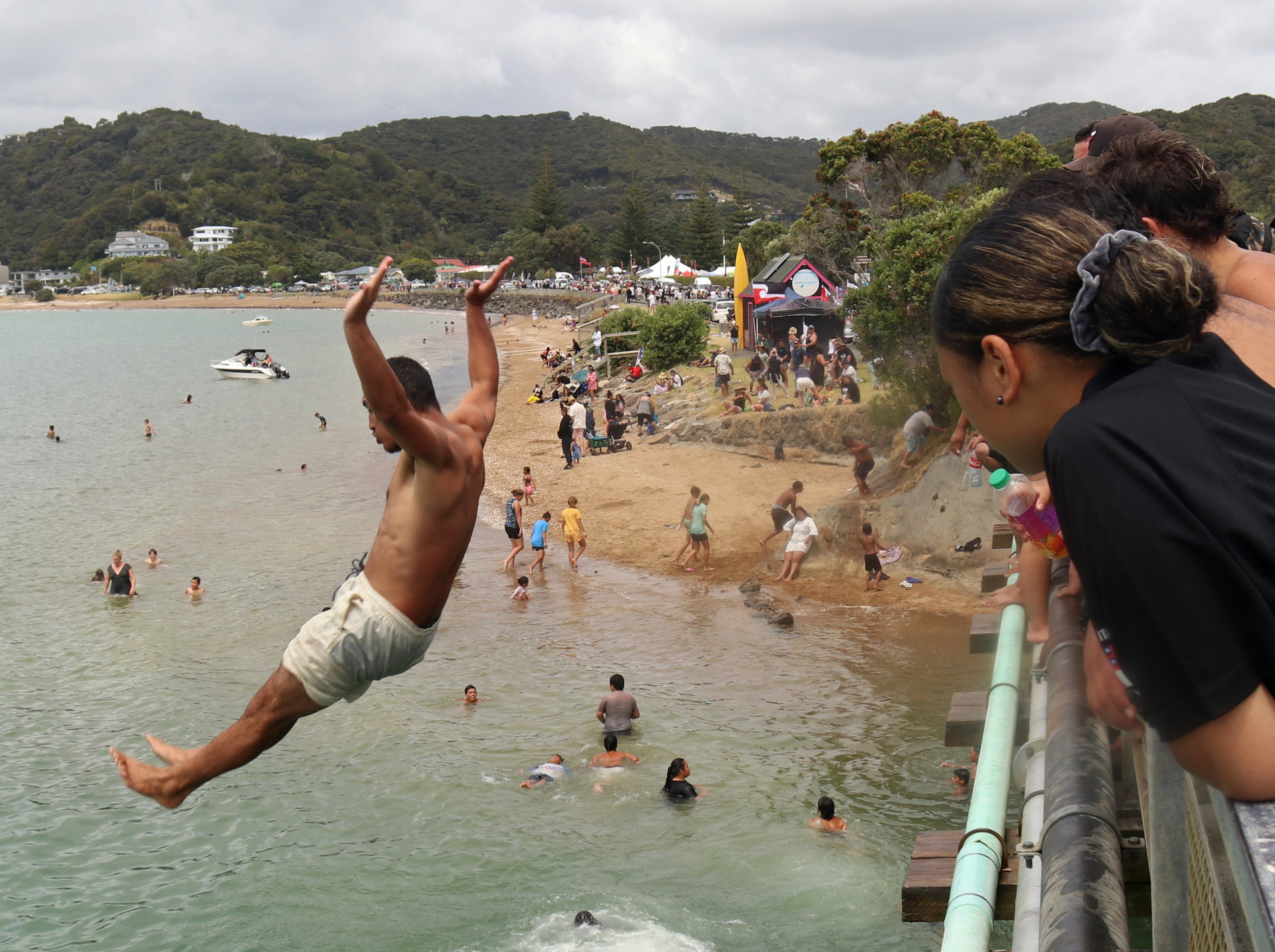 Bombs off the bridge at Waitangi are a feature of the day. Photo / Peter de Graaf