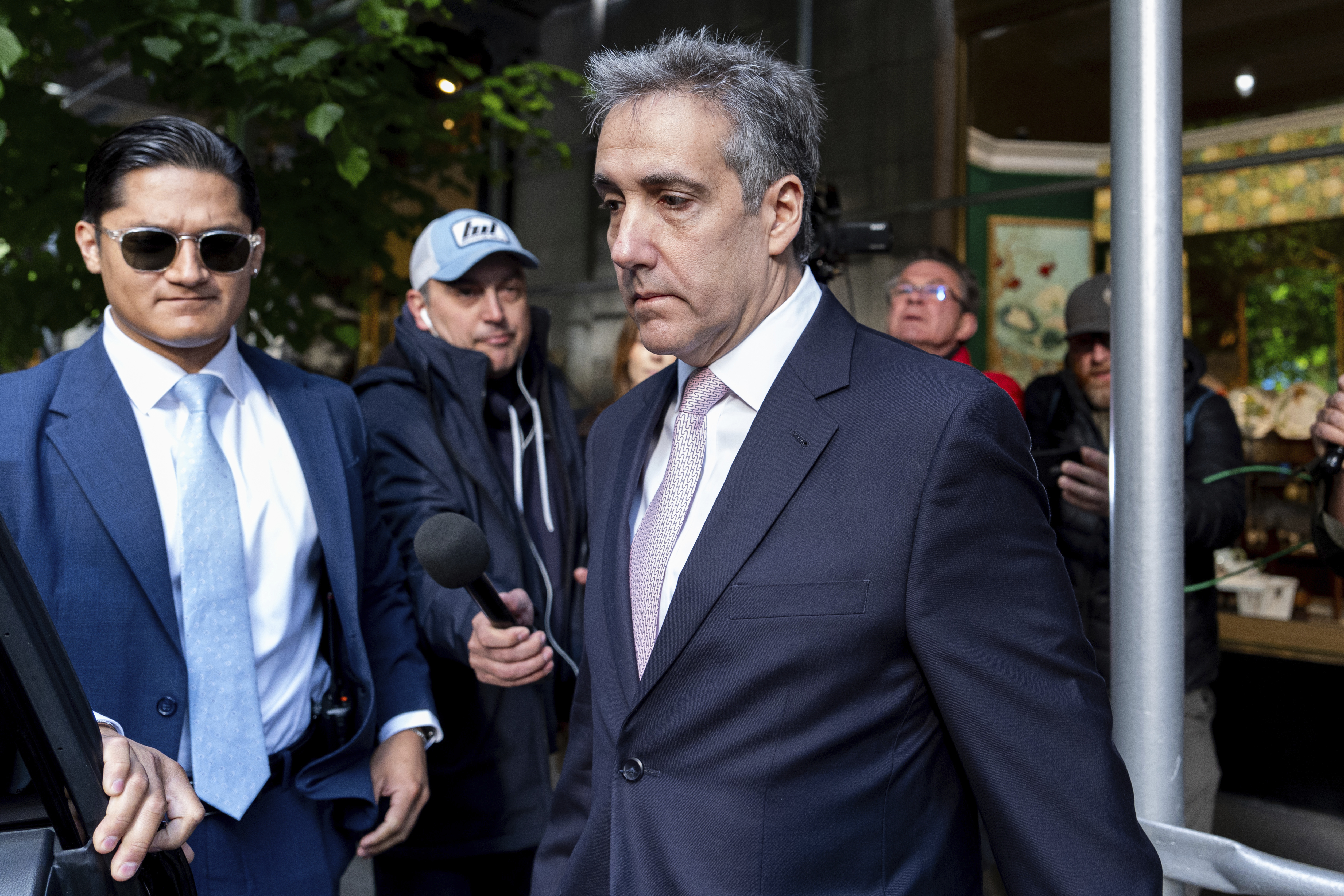 Michael Cohen leaves his apartment building on his way to Manhattan criminal court on May 13. Photo / AP