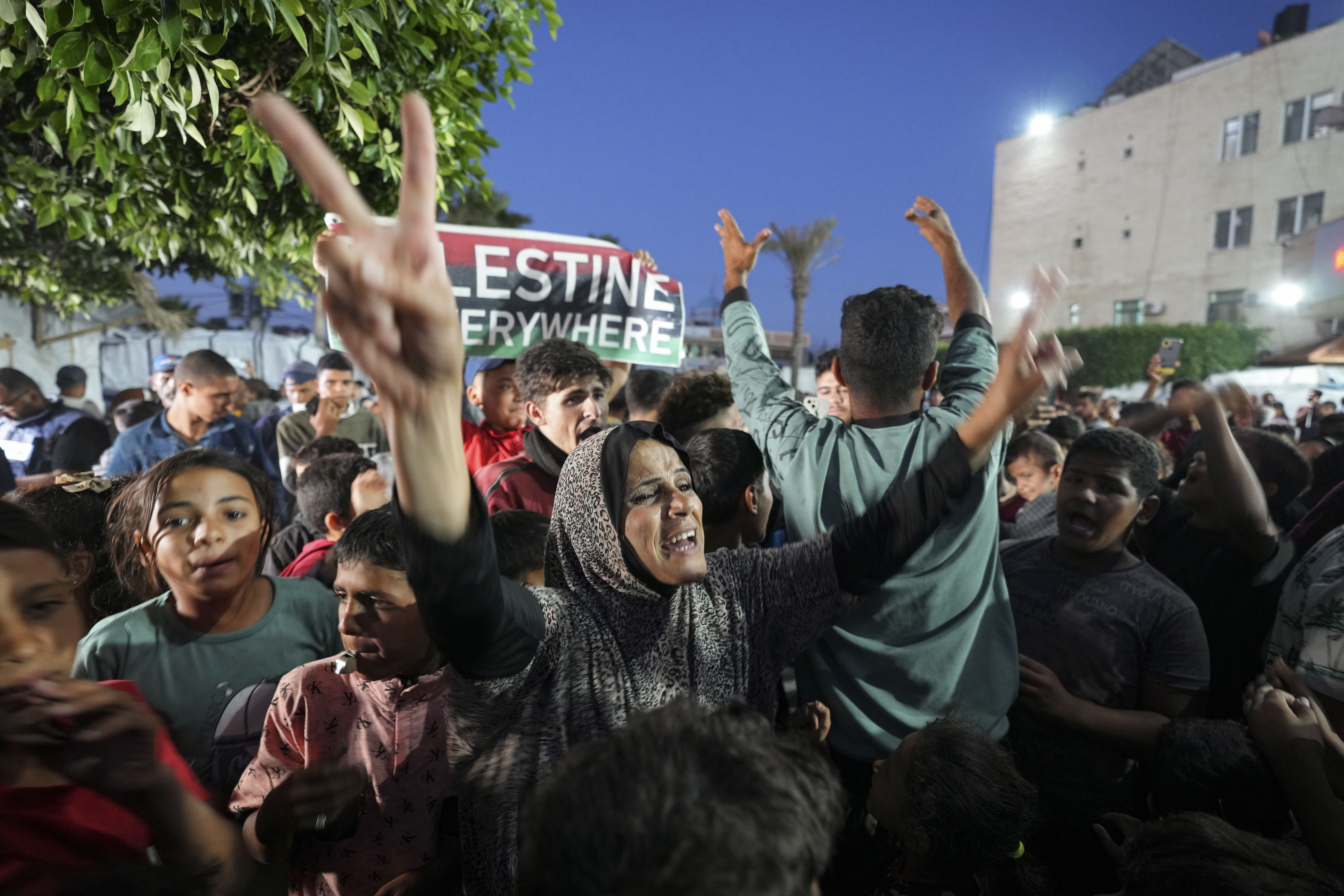 Palestinians celebrate in the streets following Hamas's announcement that it accepted a cease-fire proposal in Deir al-Balah, Gaza Strip on Monday, May 6, 2024. Despite the Hamas announcement, Israel said later Monday it would move forward with its planned offensive on Rafah, in the south of the strip. Photo / AP