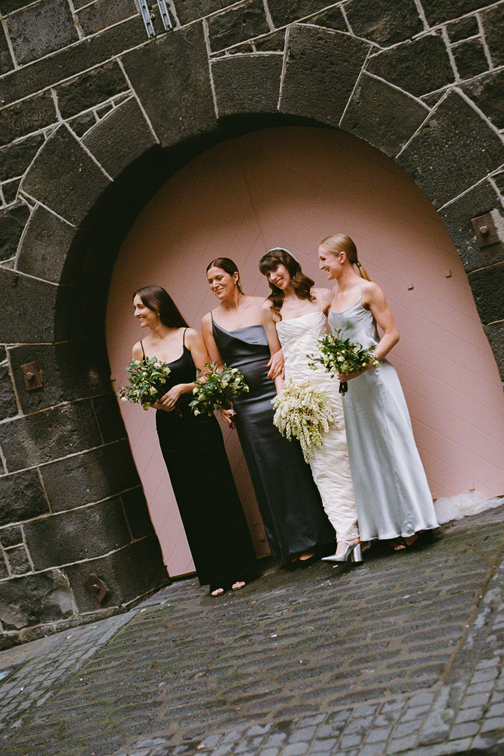 The bridesmaids all wore custom Rachel Mills dresses. Photo / Nicole Brannen.