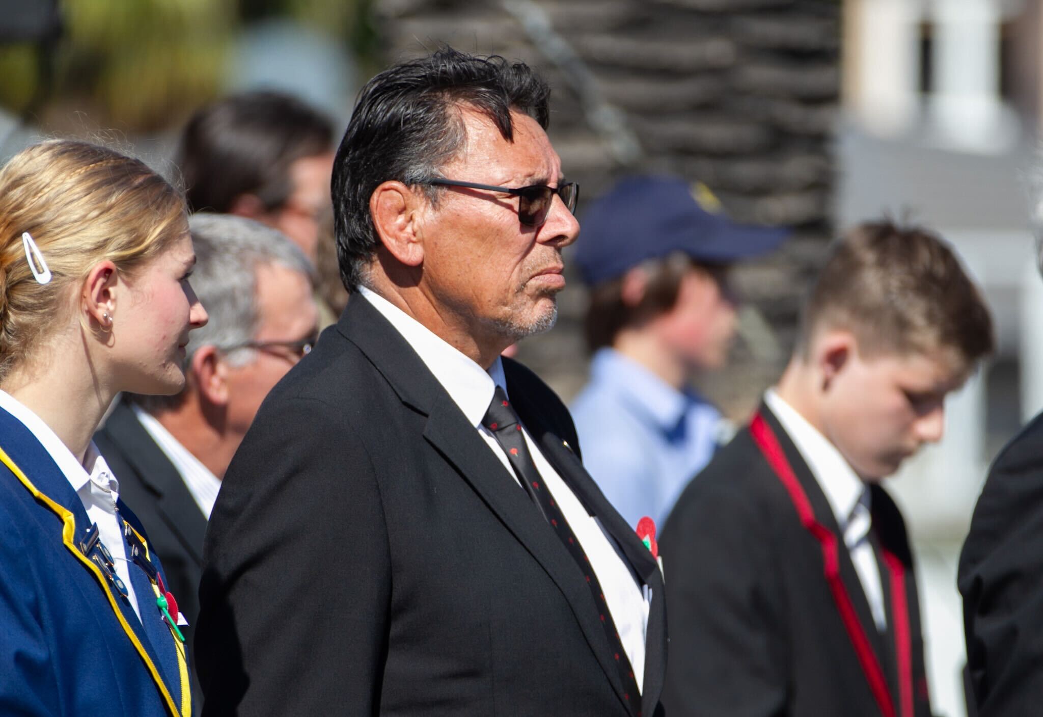 Rugby legend and RSA National President Sir Wayne 'Buck' Shelford stands with student leaders at the student Spirit of Anzac commemoration in Taradale. Photo / Warren Buckland