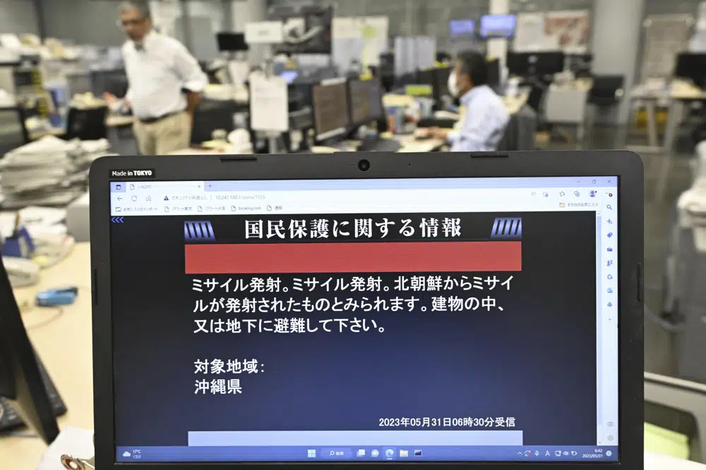 A monitor in Tokyo shows J-Alert or National Early Warning System to the residents in Okinawa, southern Japan. Photo / Kyodo News