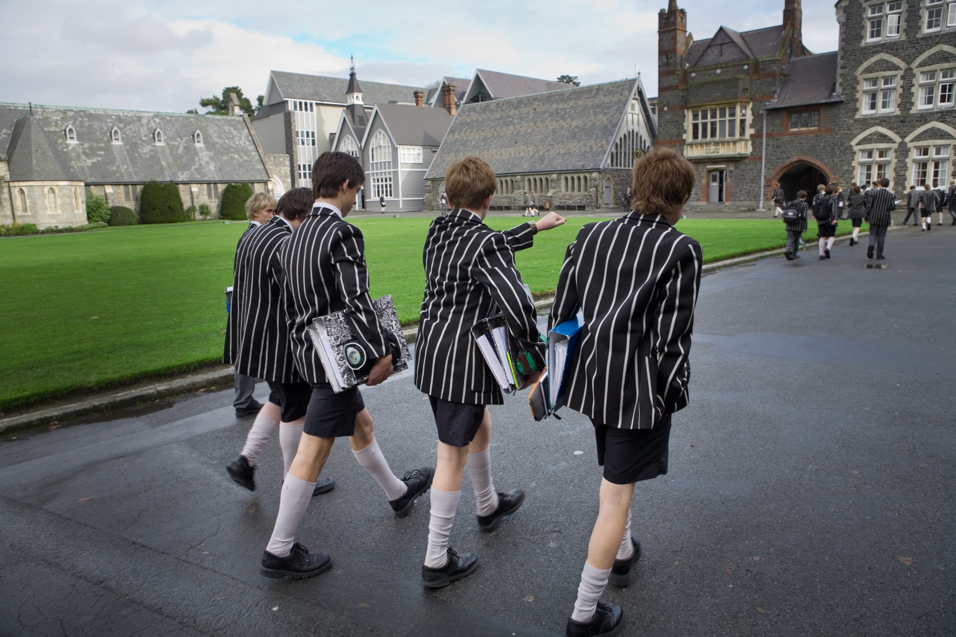 Christ's College students walking through the quad and towards 