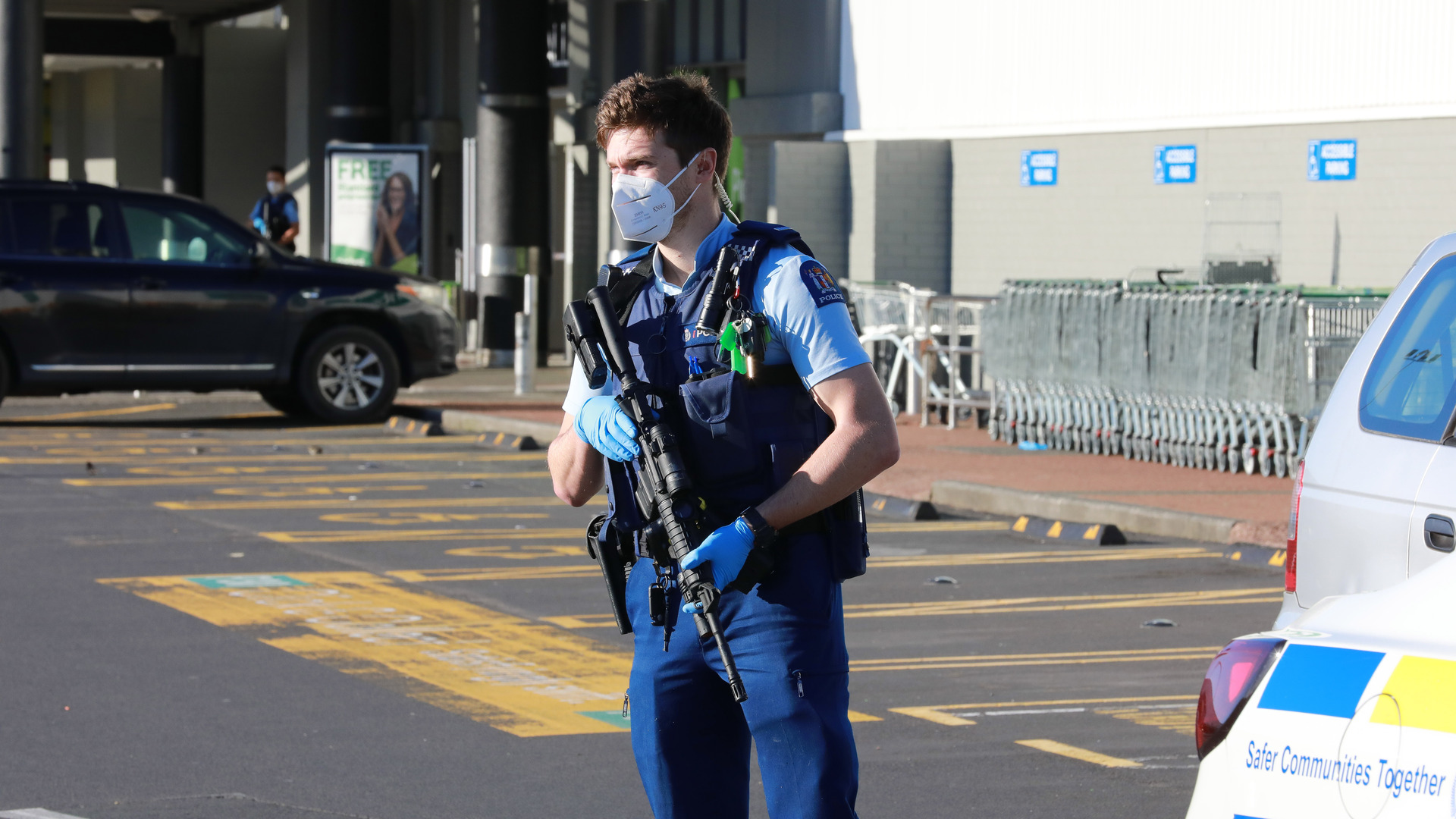 An armed police officer guards the scene the morning after eight were injured in a terrorist attack at Countdown Lynnmall in the Auckland suburb of New Lynn last September. Photo / Hayden Woodward