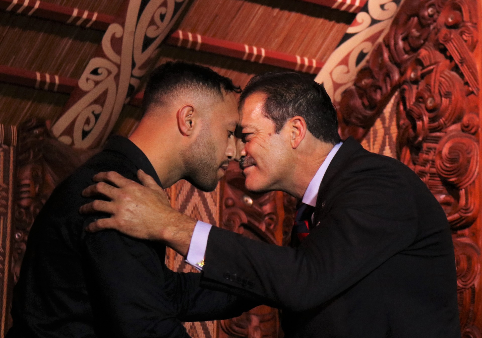Victoria Cross recipient Willie Apiata shares a hongi with vocational scholarship winner Tawhiri Kereama. Photo / Peter de Graaf