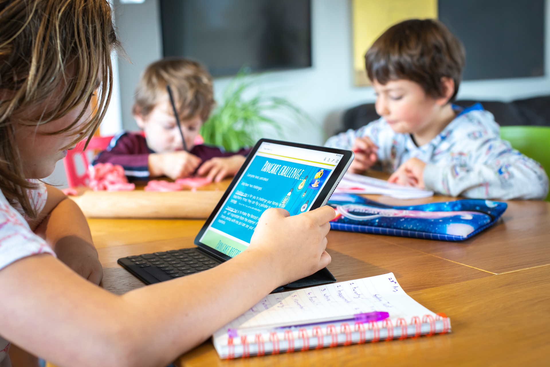 The Carter kids, from left Olivia, 9, Reuben, 3, and Levi, 6, are learning from home during level 4. Supplied photo / Alex Carter