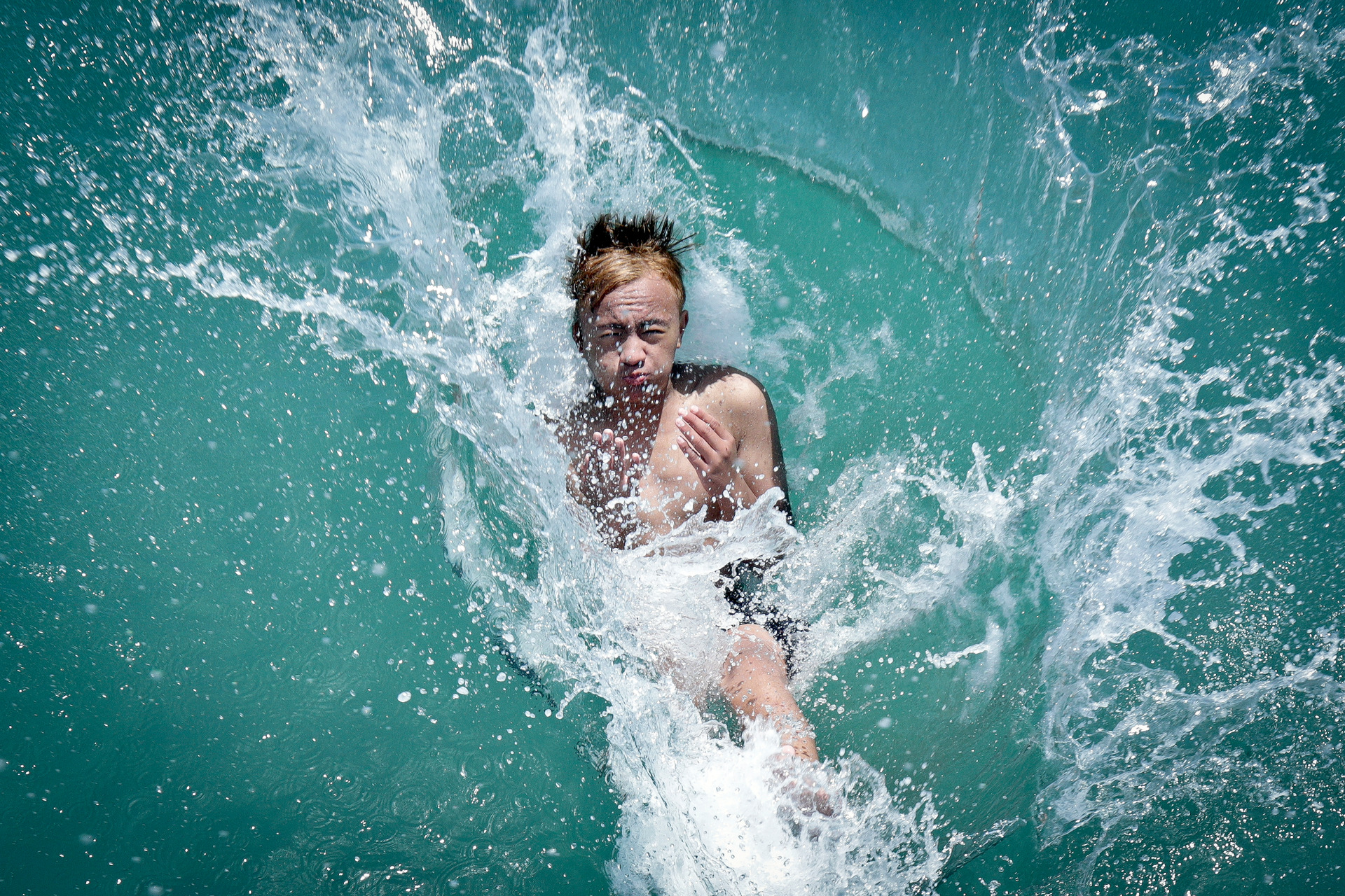 Nicholas Morrison, pictured in 2018, makes a splash with his bomb after jumping off Salisbury Wharf at Mount Maunganui's Pilot Bay. Photo / Andrew Warner