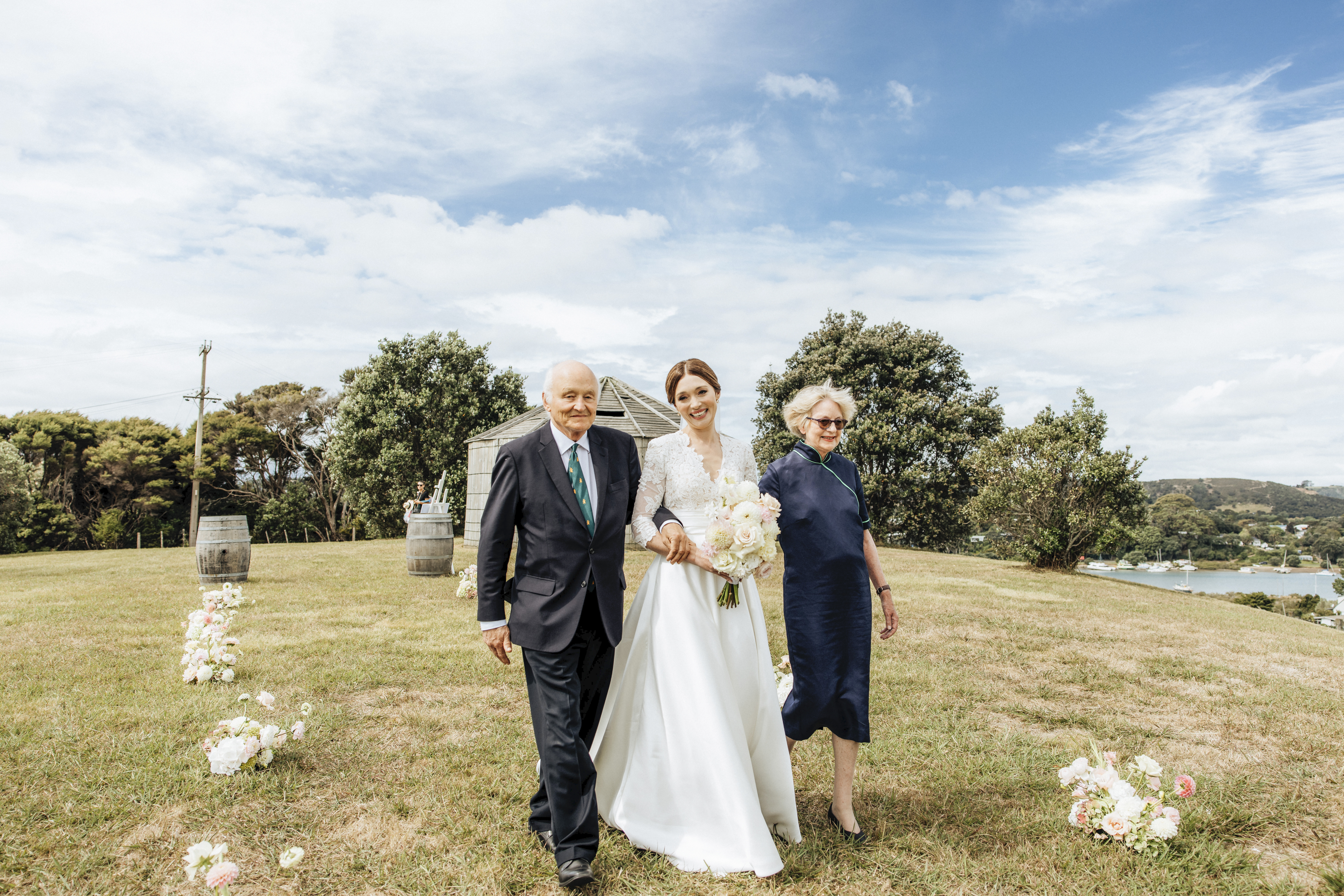 The bride was walked down the aisle by her proud parents Nicky Riddiford and John Prebble. Photo / Wildfolk Photography