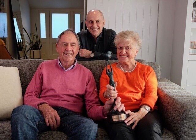 Chris Liddell (at rear) with Neal and Annette Plowman of the Next Foundation.