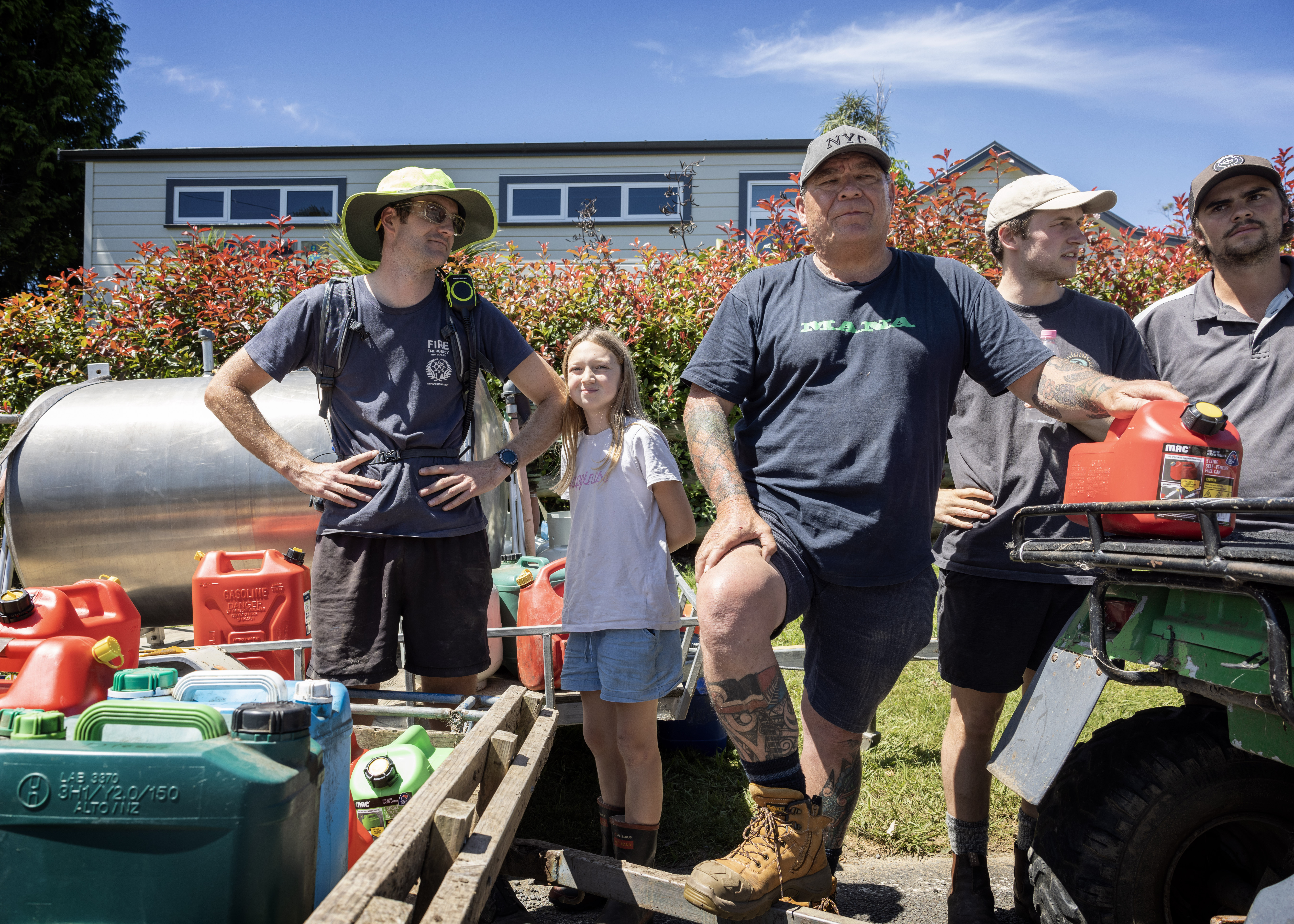 Tama Heremaia (centre) is in charge of security and fuel in Patoka. Photo / Mike Scott