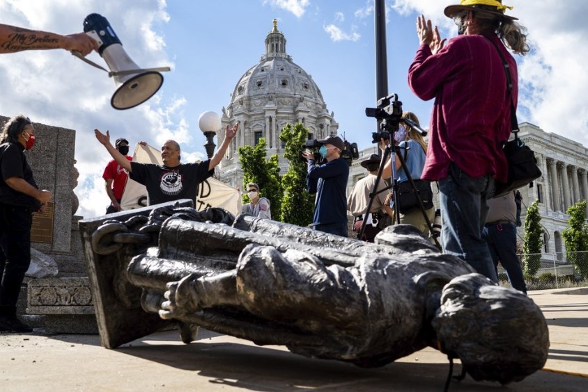 A Christopher Columbus statue is toppled at the Minnesota state Capitol in St Paul, the United States. Photo / AP