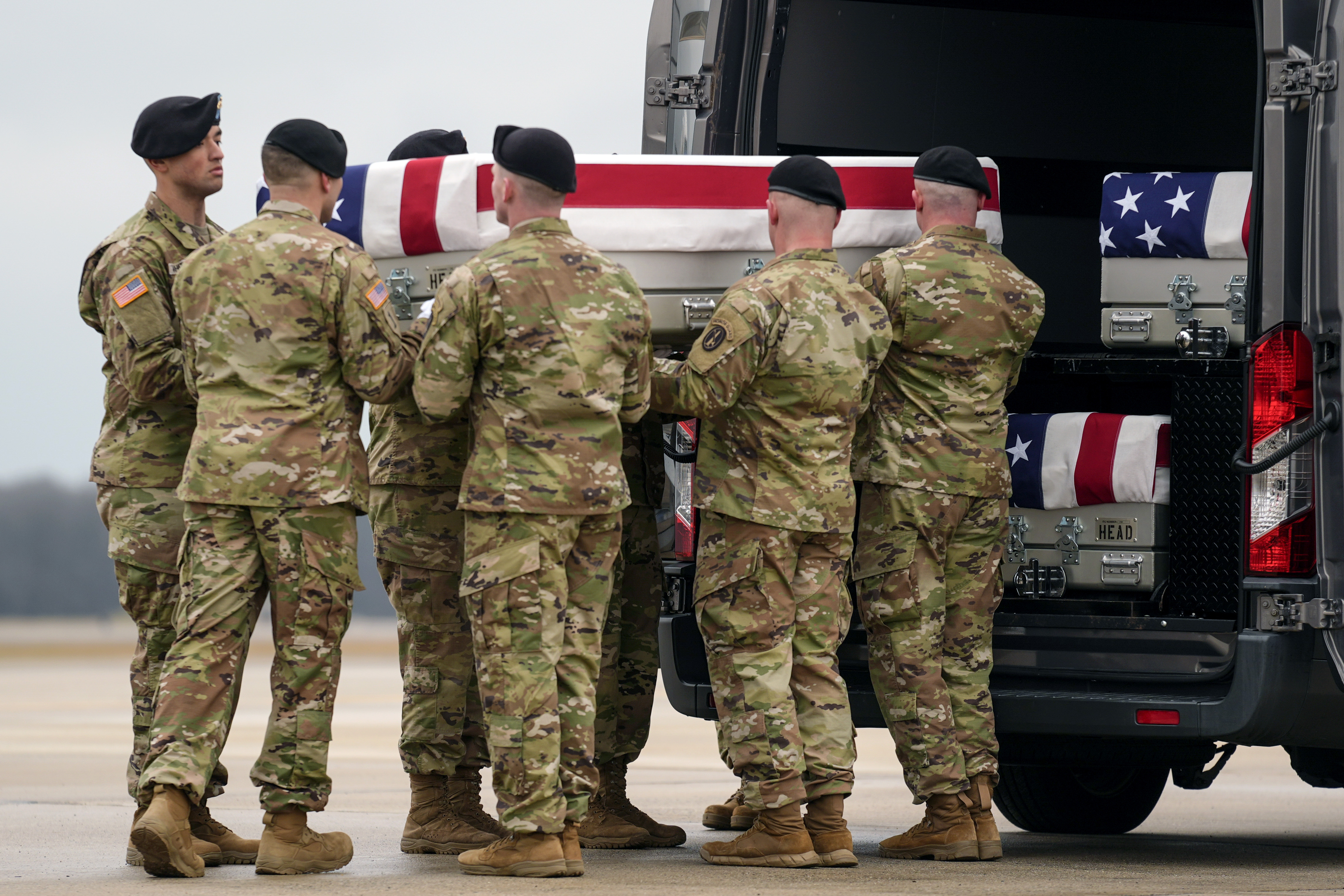 An army carry team loads the transfer case containing the remains of US Army Sgt. Kennedy Ladon Sanders, 24, of Waycross, Ga., to a vehicle along with the remains of Sgt. William Jerome Rivers, 46, of Carrollton, Ga., and Sgt. Breonna Alexsondria Moffett, 23, of Savannah, Ga., at Dover Air Force Base. Photo / AP