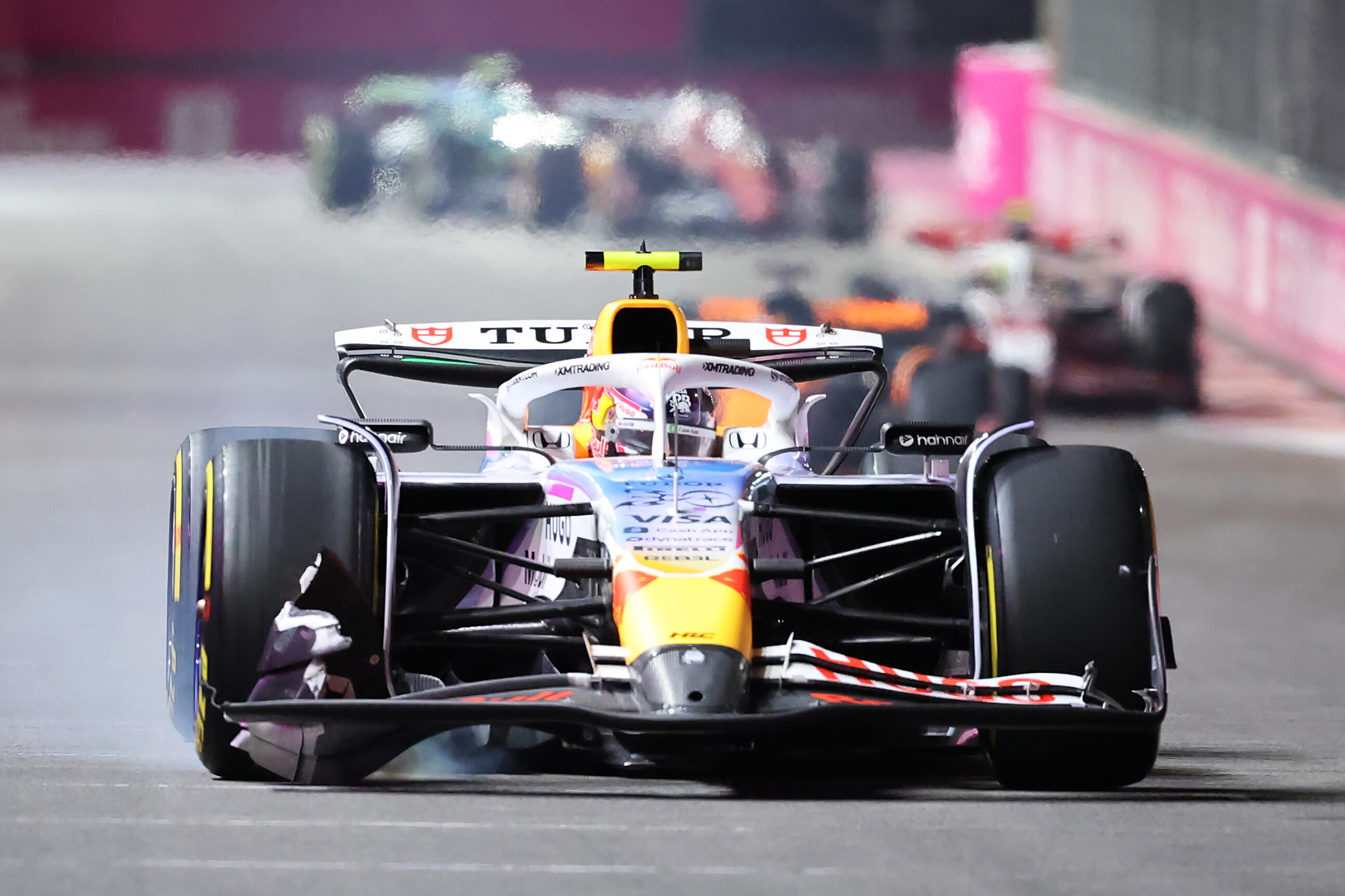 Liam Lawson suffered front wing damage on the opening lap of the Las Vegas Grand Prix. Photo / Red Bull