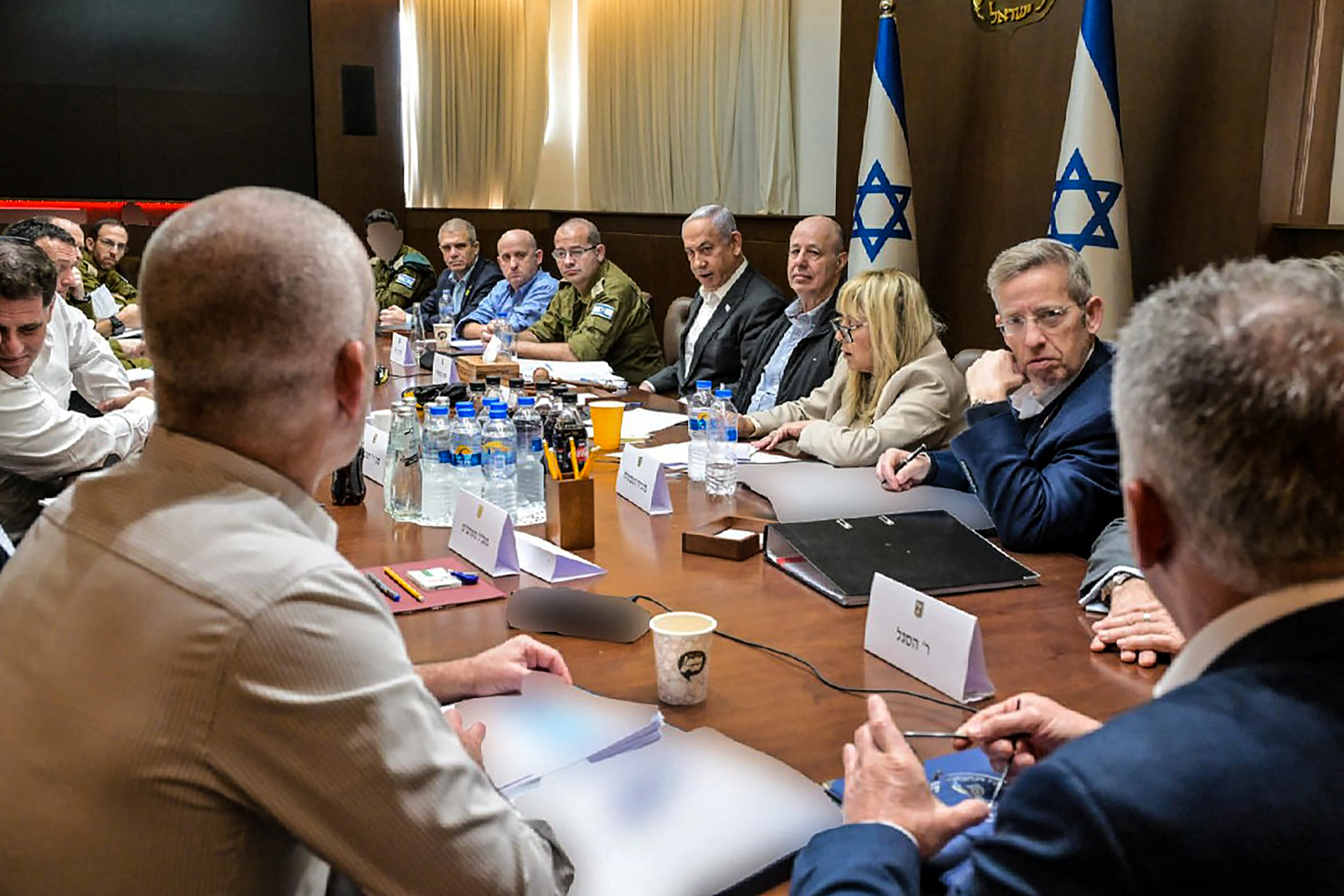 Israeli Prime Minister Benjamin Netanyahu (fifth right) heads a security Cabinet meeting to vote on a Gaza ceasefire and a hostage release deal. Photo /  AFP