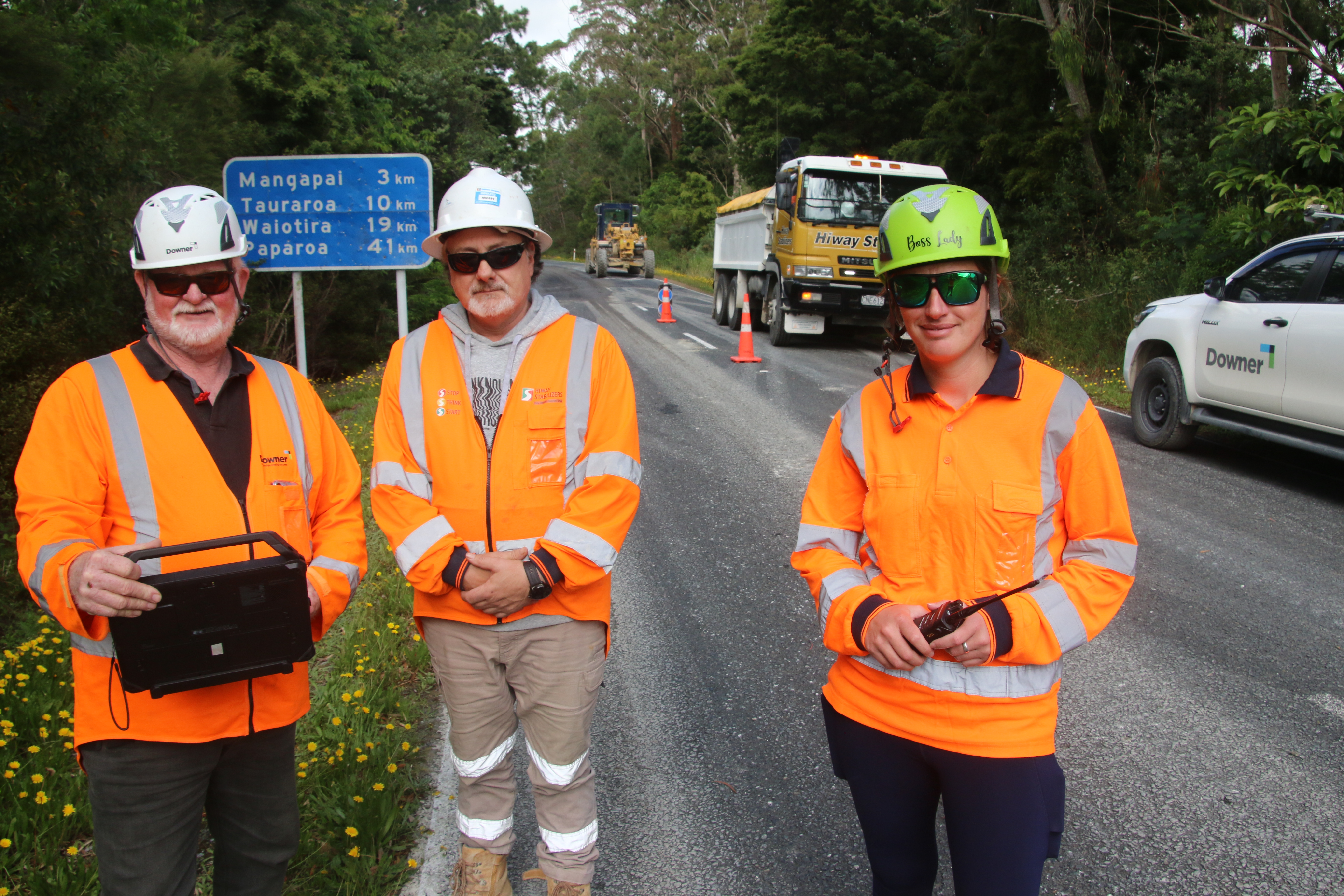 Buster Sandford from Downer, Mike Monigatti from Hiway Stabilizers and Sasha Linton from Downer have been working hard with roading crews in recent weeks to improve the local road alternatives to the Brynderwyn Hills.
