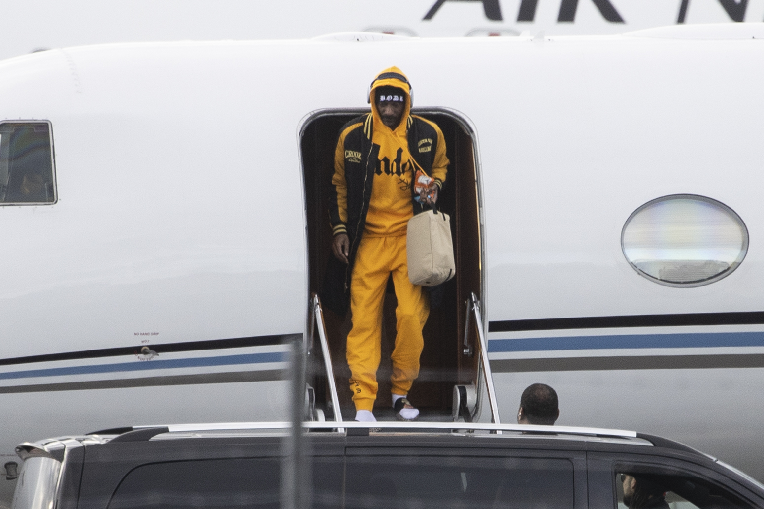Legendary US rapper Snoop Dogg landing in Christchurch last year. Photo / George Heard