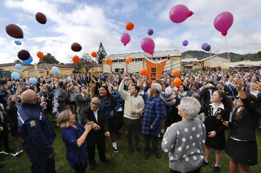 Whangarei Girls' High School students release balloons with positive affirmations attached to them. Photo / John Stone