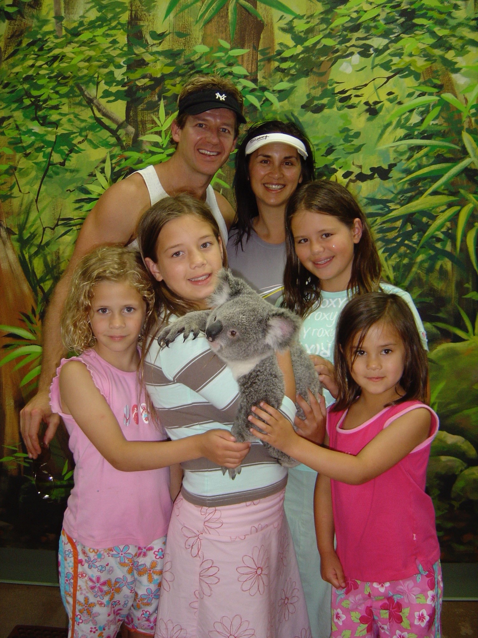 Simon and Jodi Barnett with their girls on a family holiday in Australia - from left: Bella, Sophie, Samantha and Lily. 