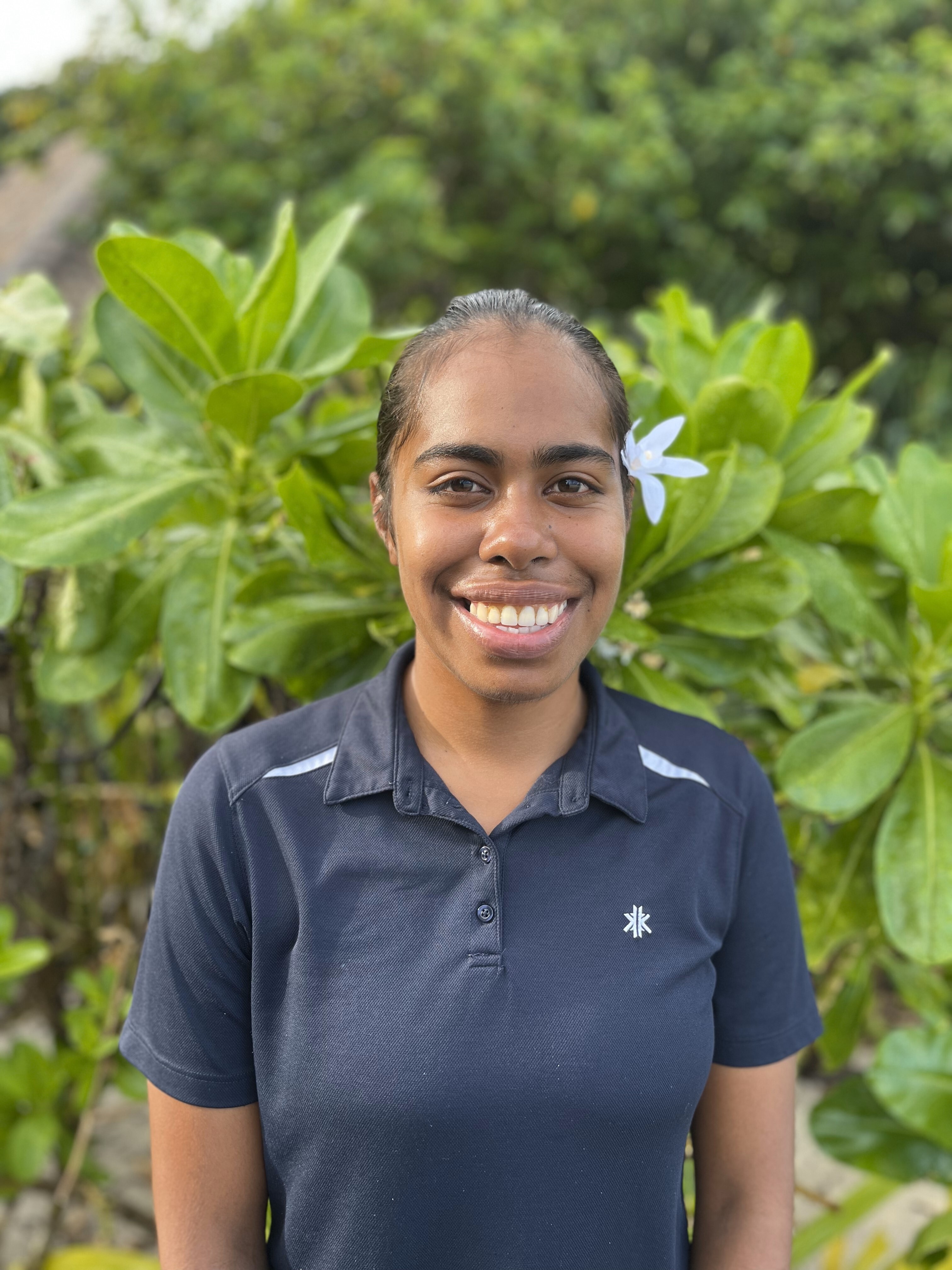 Marine biologist Lily embodies the warm Bula spirit of Fijian hospitality.