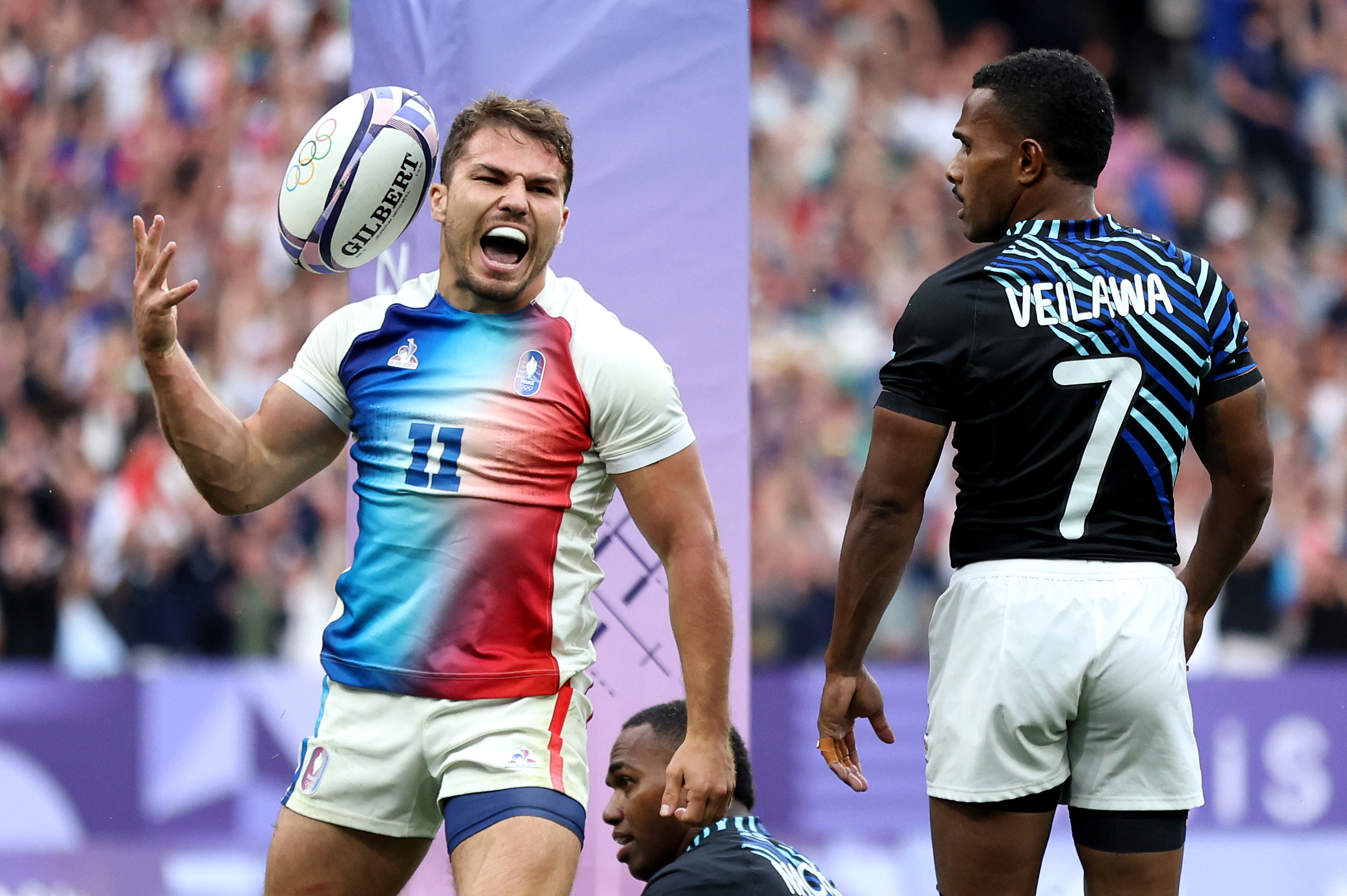 Antoine Dupont celebrates after scoring a try during the men's Sevens gold medal match between France and Fiji. Photo / Getty Images