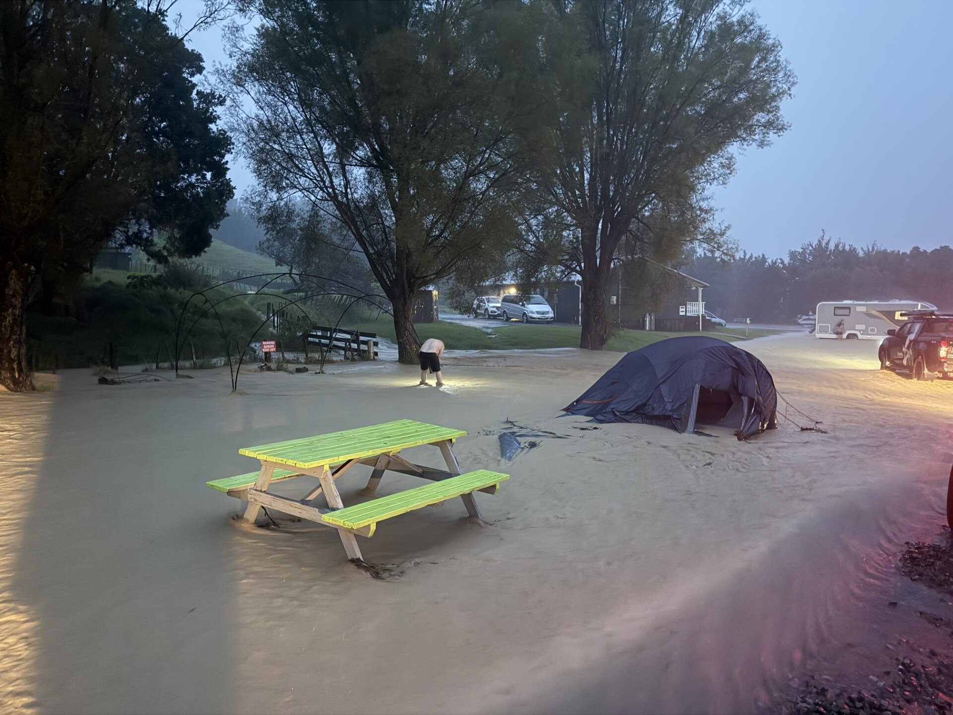 In the early hours of Sunday, a river of muddy debris suddenly came crashing through the families' campsite. Photo / Supplied