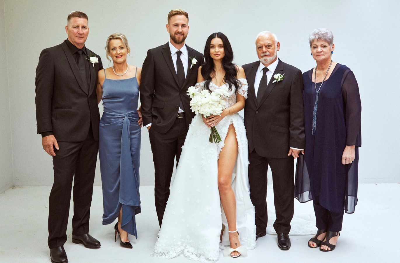 With Reid's parent's Brian and Tania, and Edna's dad Morkel and stepmum Ansa. Photo / jonnyscottphoto.com