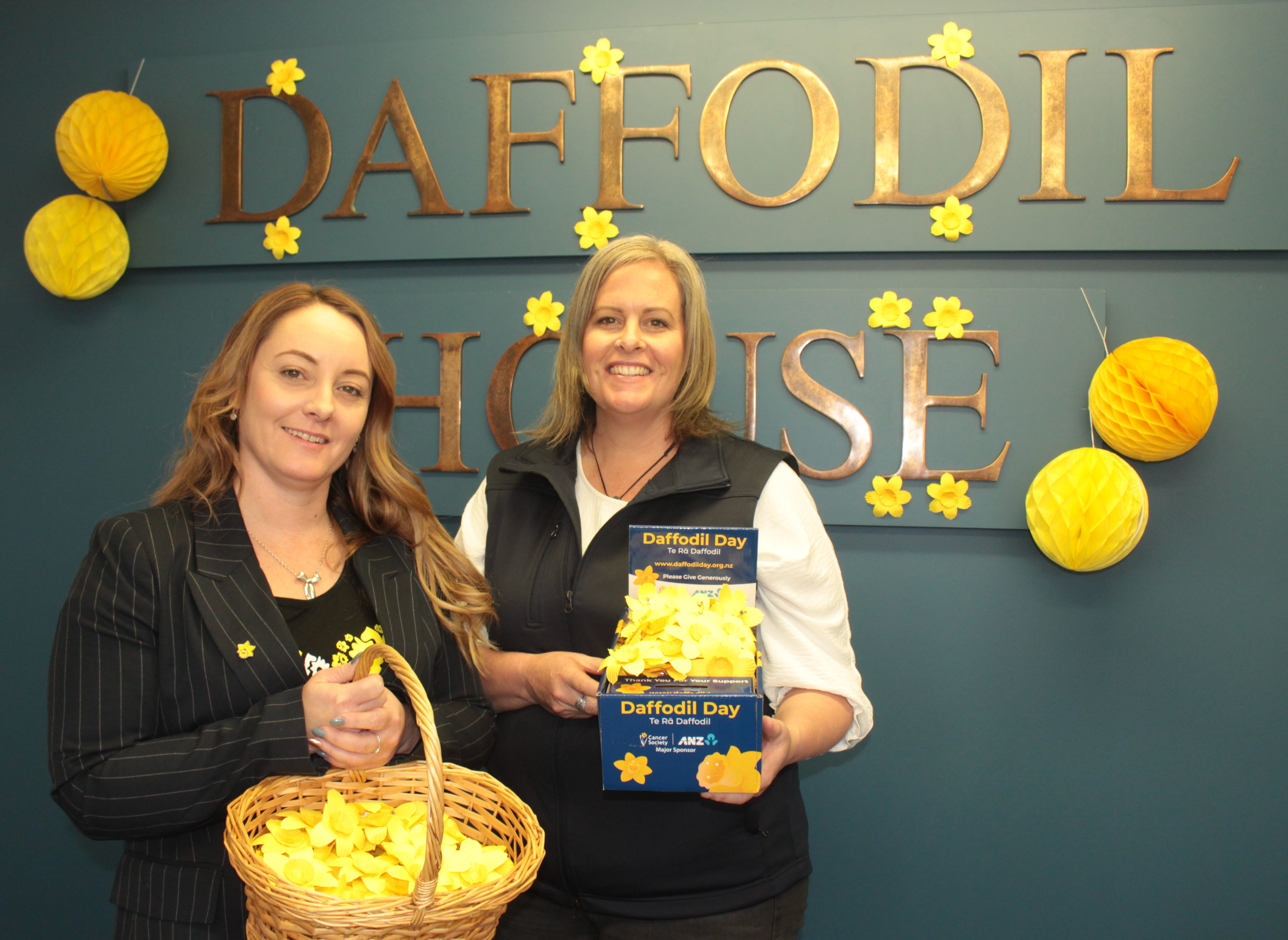 Cancer Society Auckland Northland team members Charli Timms and Selena Kirk are all set for Daffodil Day on Friday. Photo / Denise Piper