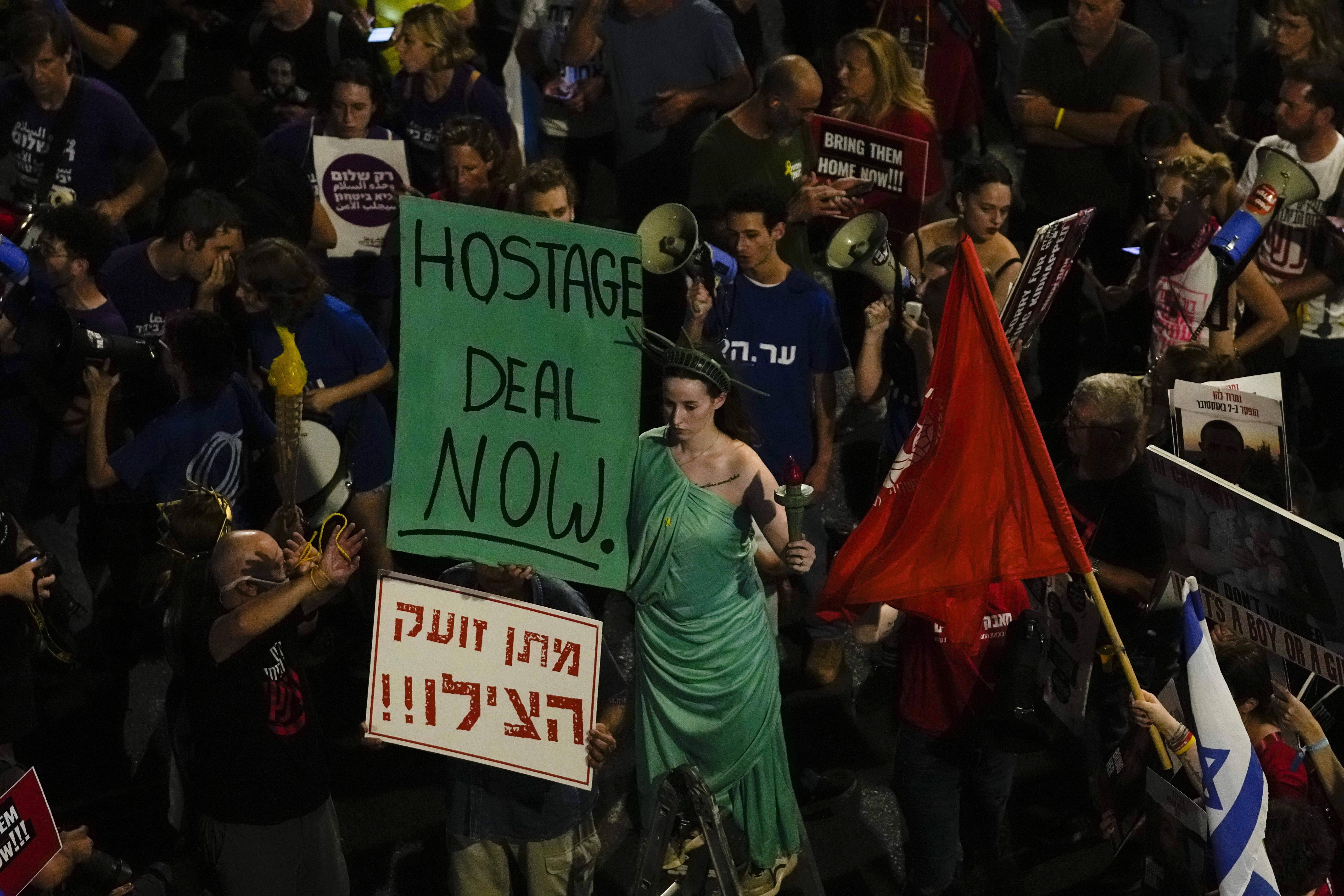 People protest against Israeli Prime Minister Benjamin Netanyahu's government and call for the release of hostages held in the Gaza Strip by the Hamas militant group, in Tel Aviv, Israel on June 1. (AP Photo/Maya Alleruzzo)