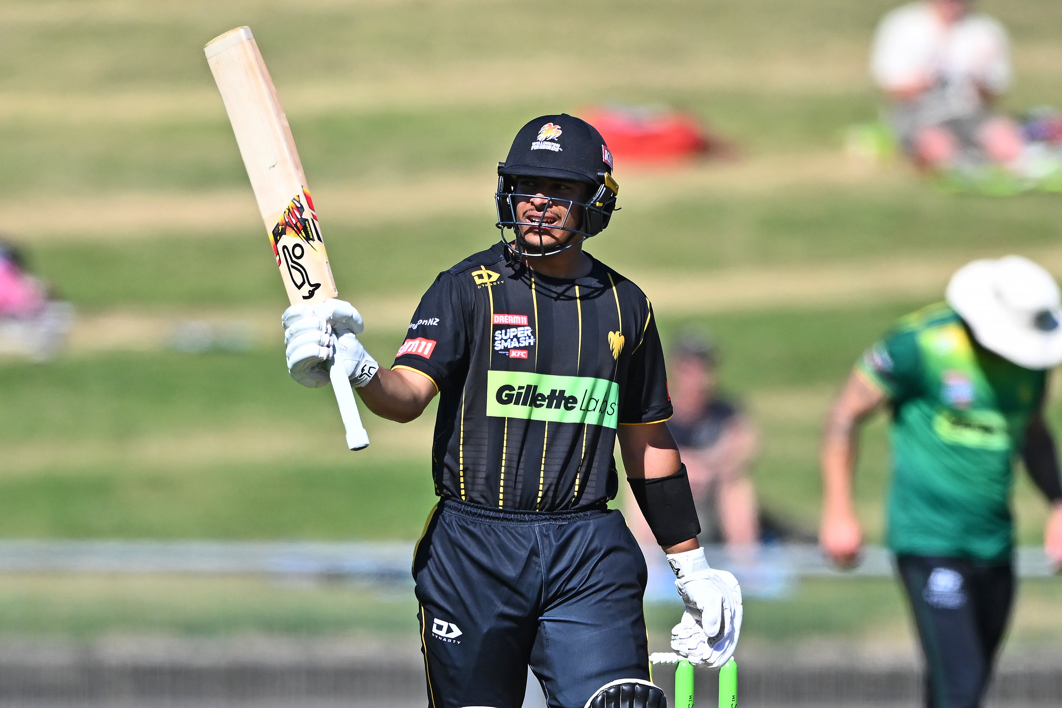 Muhammad Abbas celebrates his half-century for Wellington. Photo / Photosport