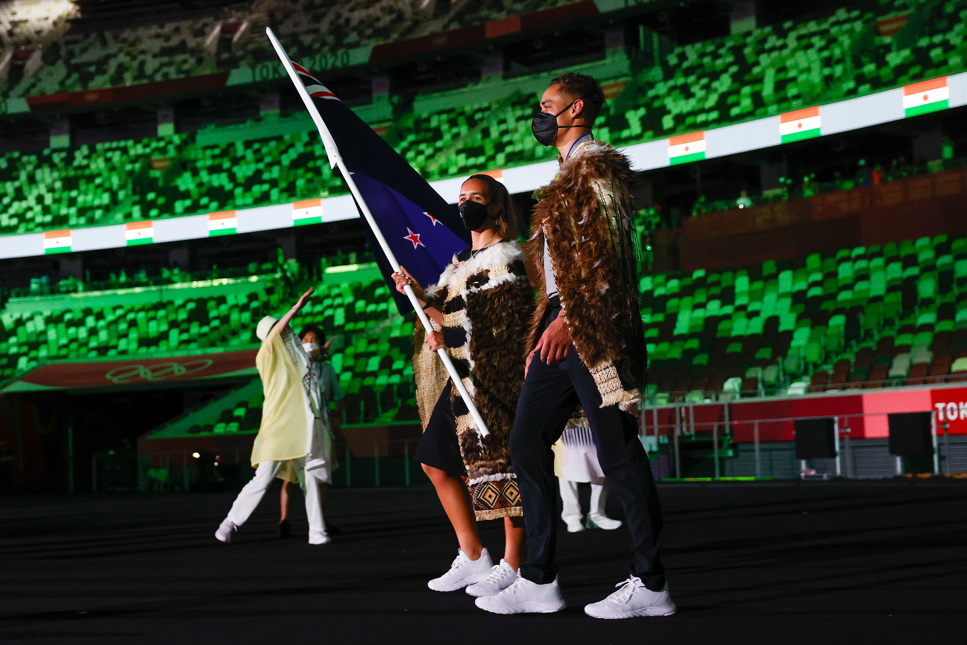 Sarah Hirini and David Nyika wearing Te Māhutonga as flagbearers at the opening ceremony in Tokyo. Photo / Getty Images