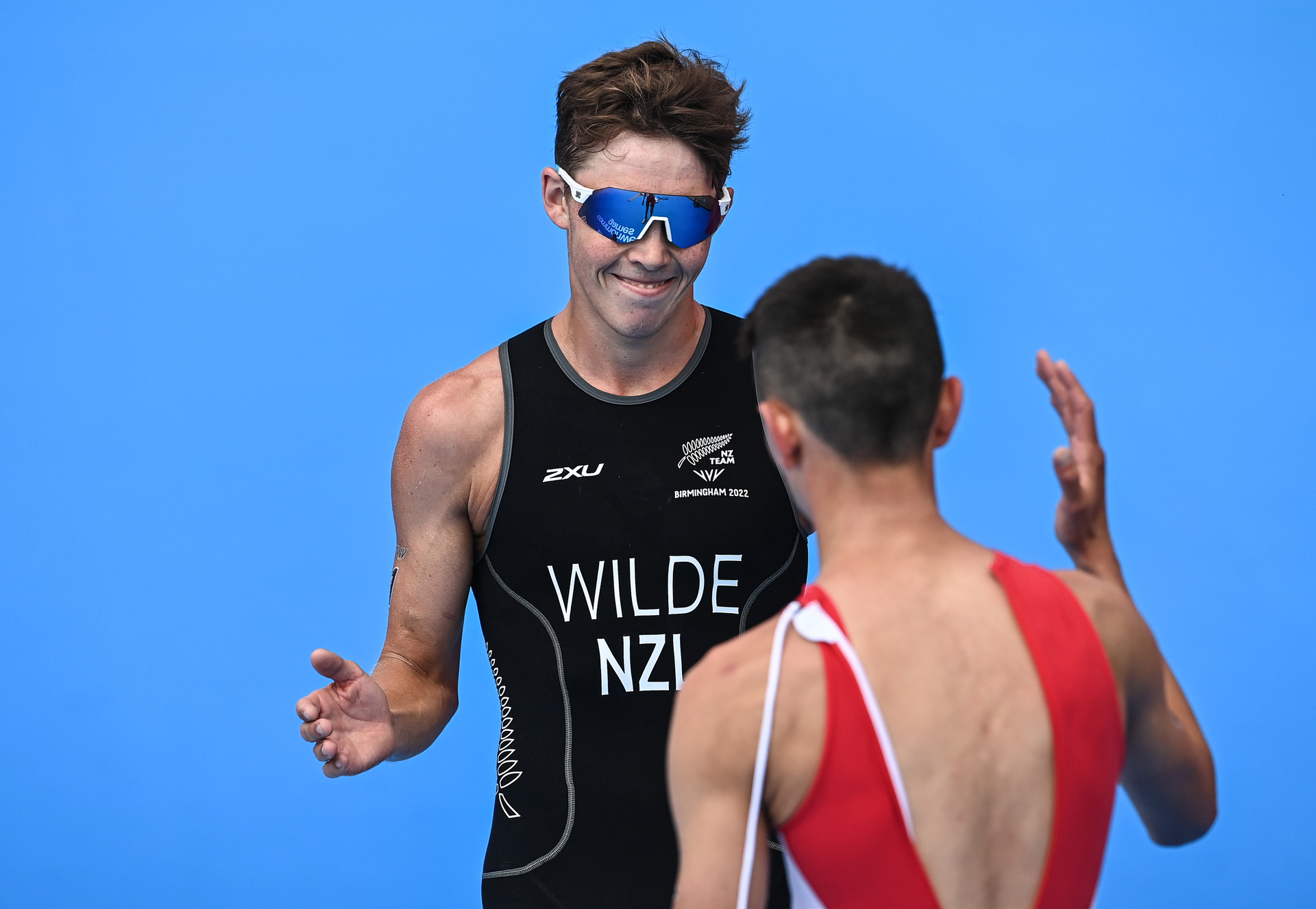 New Zealand's Hayden Wilde congratulates England's Alex Yee. Photo / Photosport