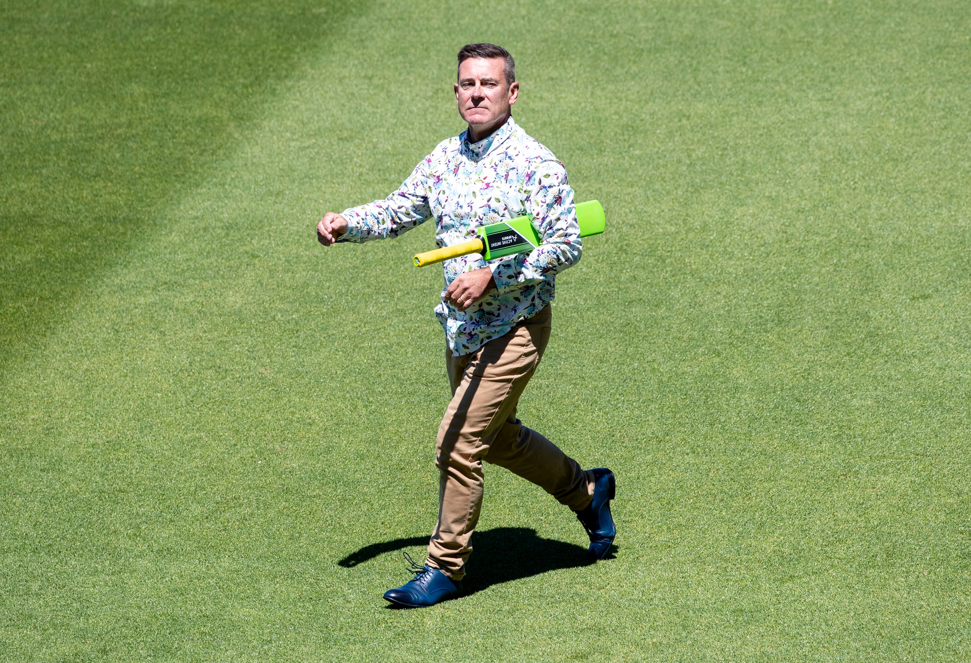 Michael Woodhouse carrying his bat in fine fashion after being dismissed while playing cricket during the National Party caucus retreat. Photo / Mark Mitchell