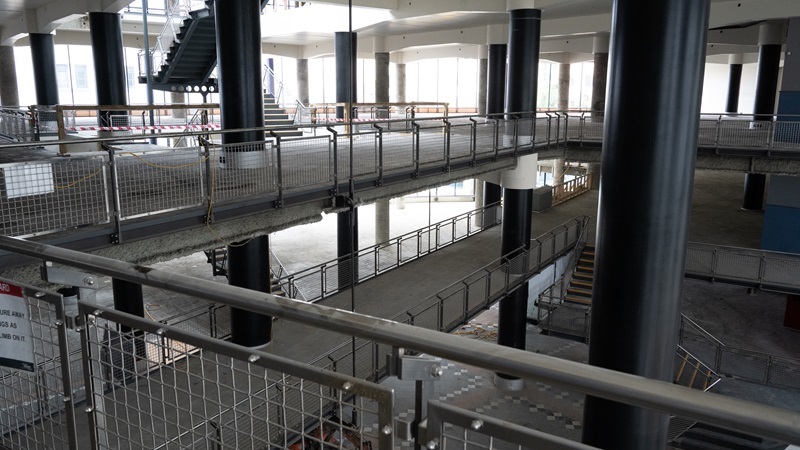 The central stairway on the ground floor. Photo / Supplied