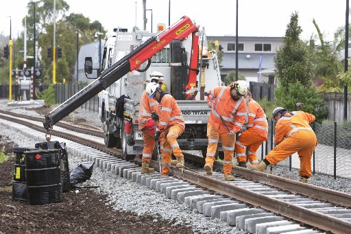 KiwiRail workers doing maintenance work on the Whangārei to Kauri rail line. Photo / Tania Whyte
